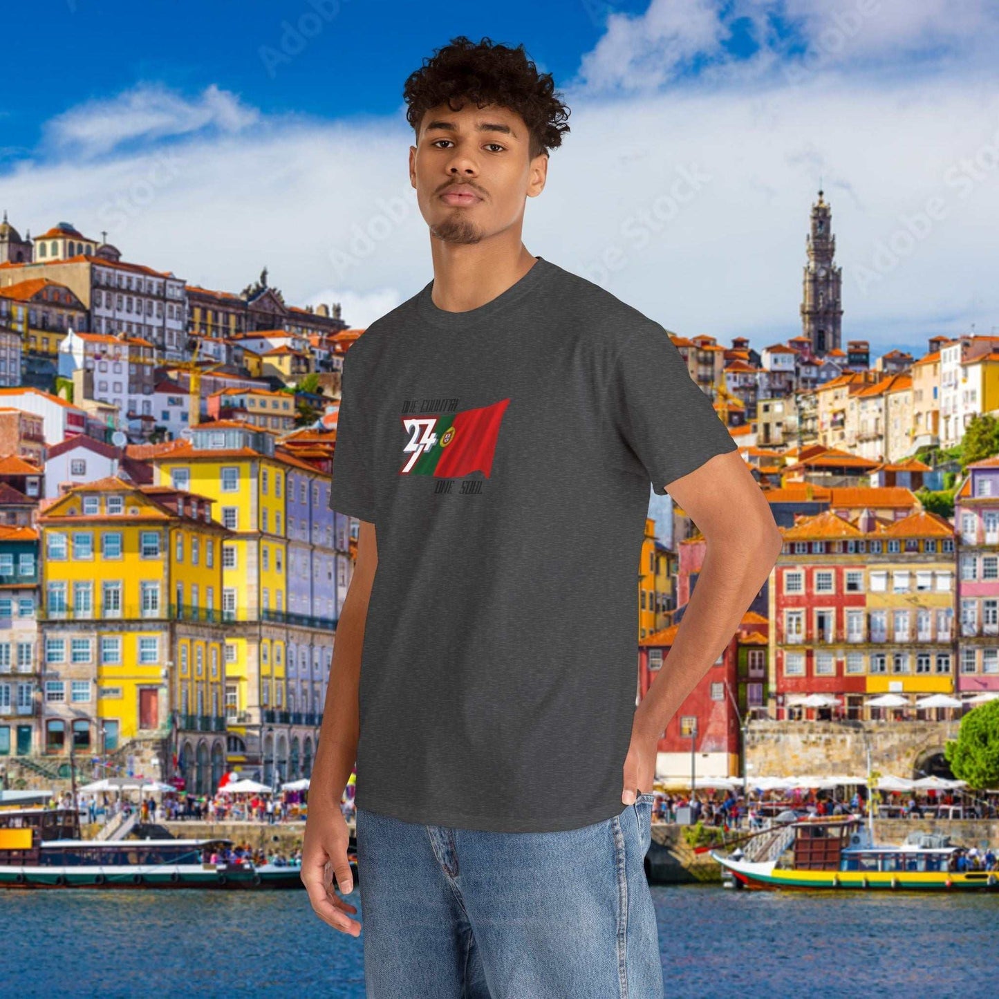 Male model wearing the hand-drawn Portugal flag t-shirt in dark gray, styled for a casual athletic look.