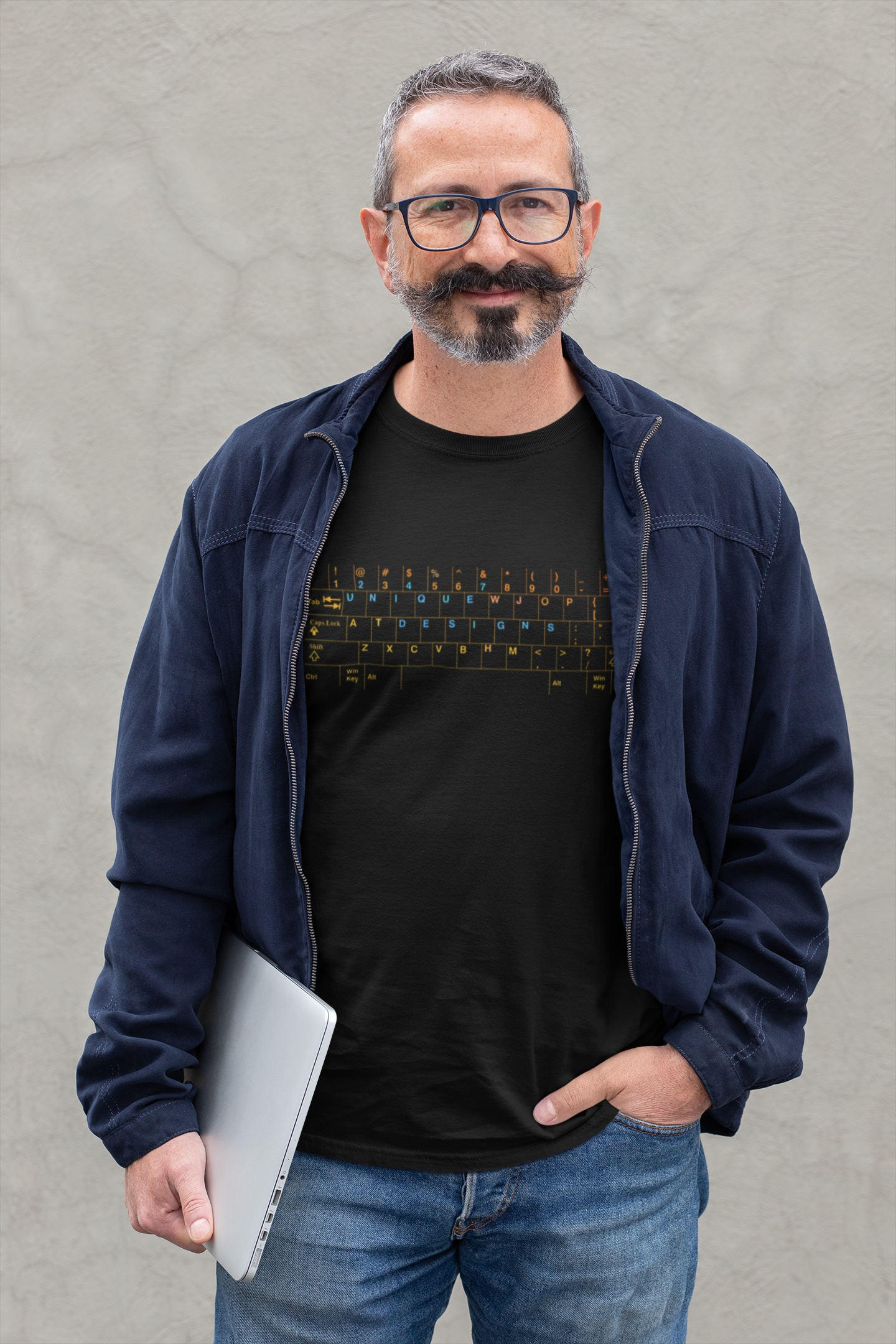 Male model demonstrating the classic unisex fit of the black 24/7 Unique Designs programmer shirt.