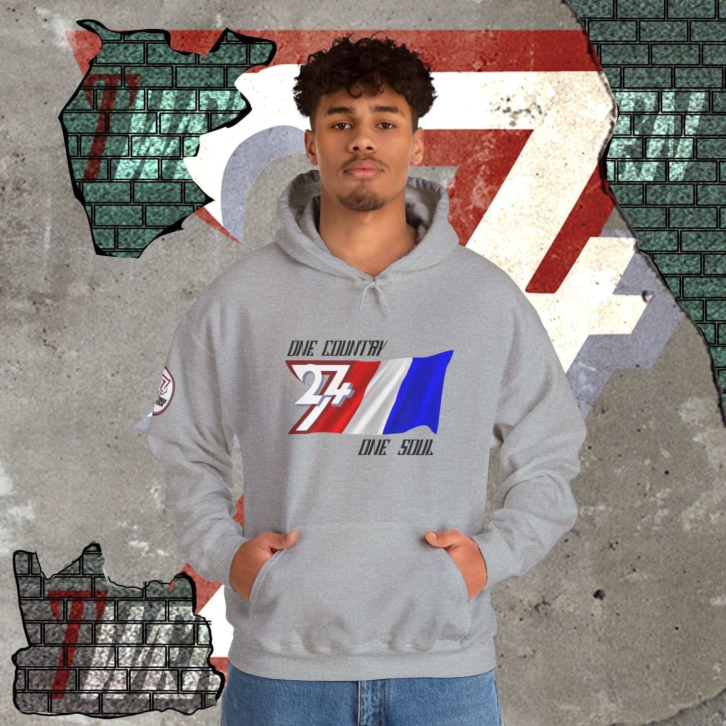 A model wearing the France "Élan" hoodie in Sport Gray, styled for a contemporary, high-tier global streetwear look.