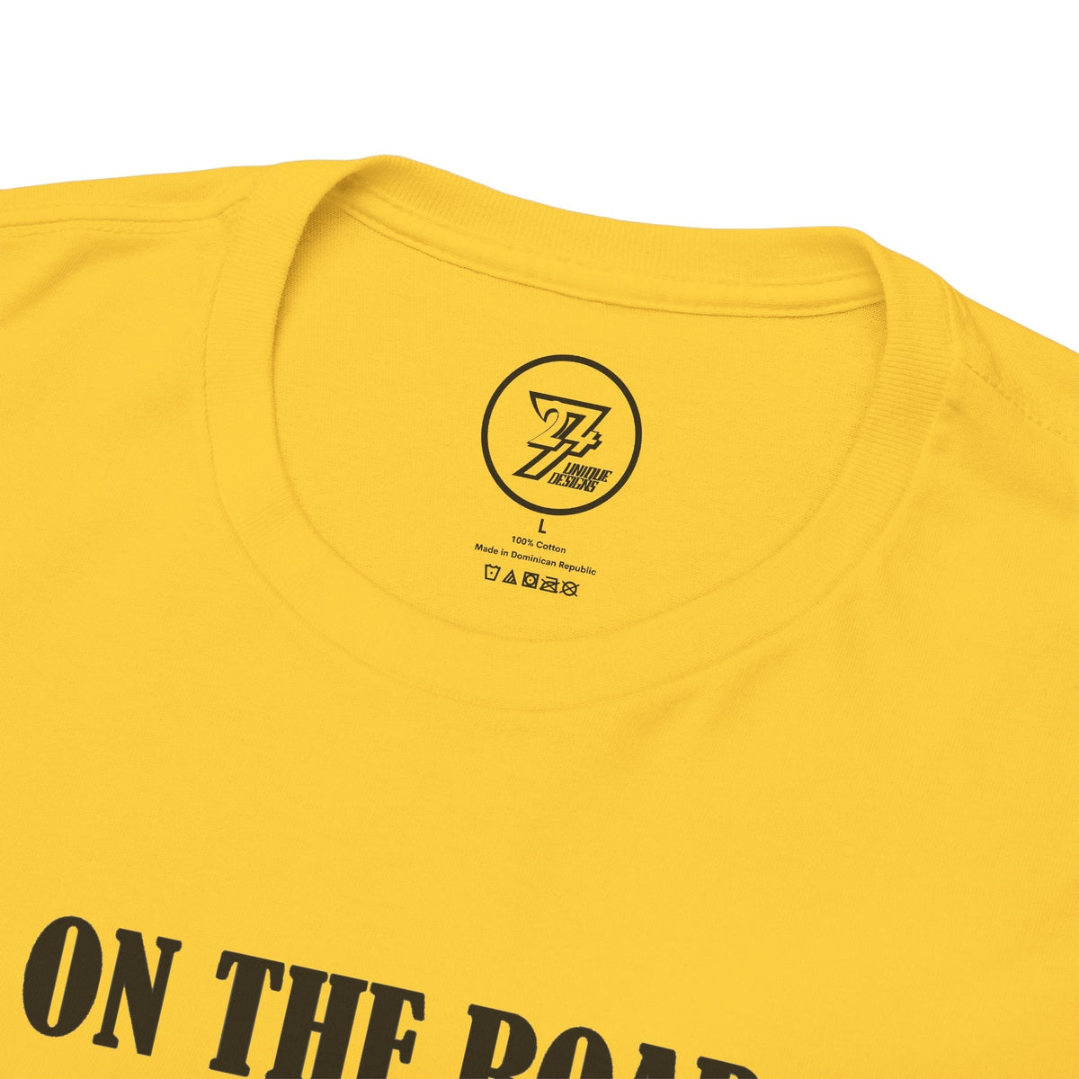 Close-up of the ribbed knit collar on the daisy yellow Father's Day car shirt, clearly showing the official 24/7 Unique Designs trademark logo inner label branding.