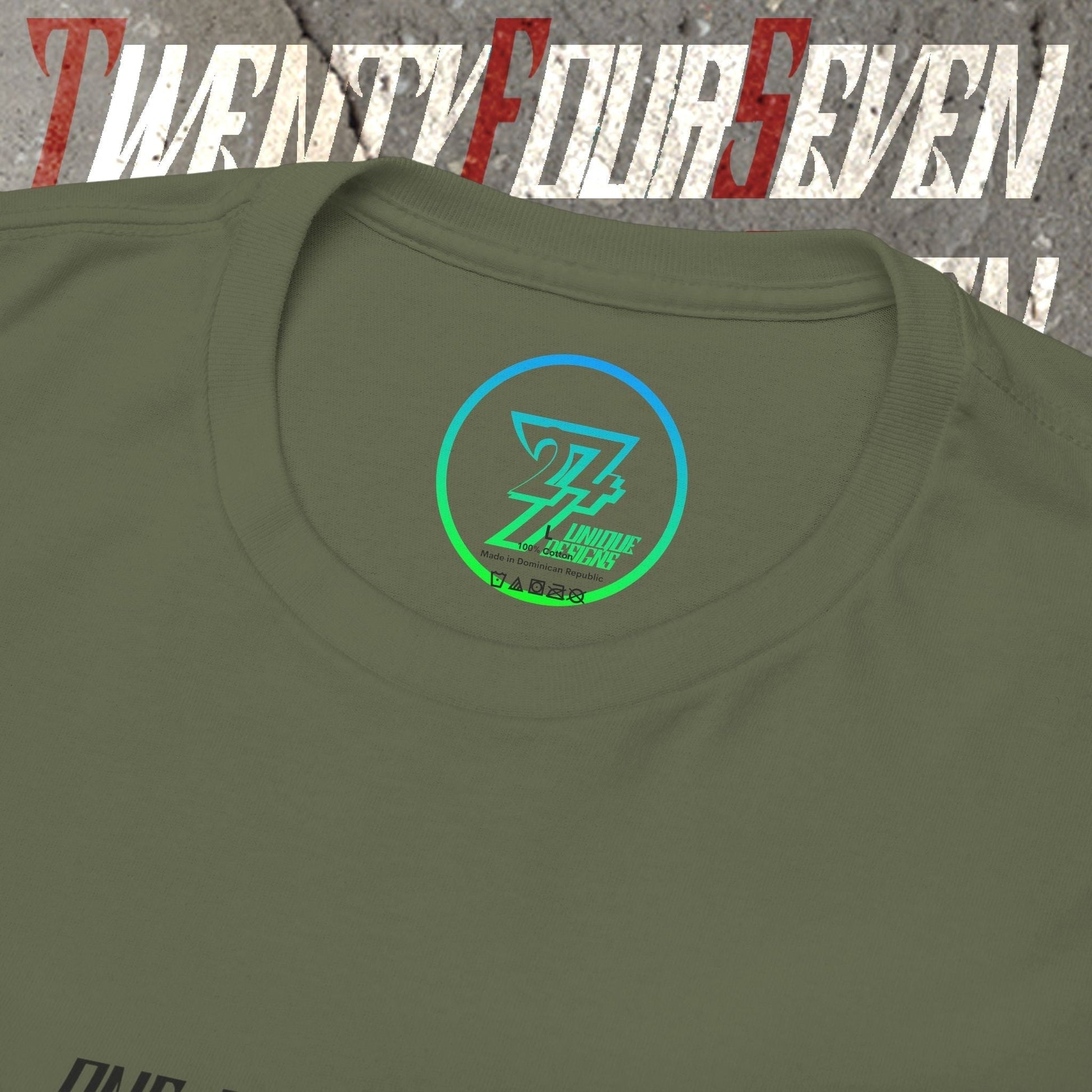 Close-up of the inner neck label showing the authentic 24/7 Unique Designs™ trademark logo on the Canada flag tee.