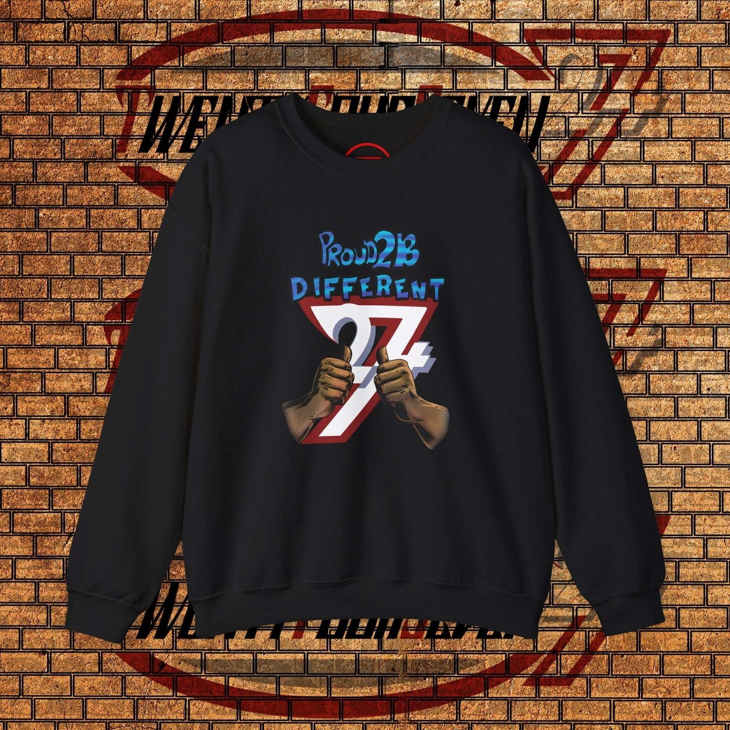 Black artistic sweatshirt with "proud 2 b different" slogan and hand-drawn graphic, crewneck style, medium-weight cotton blend