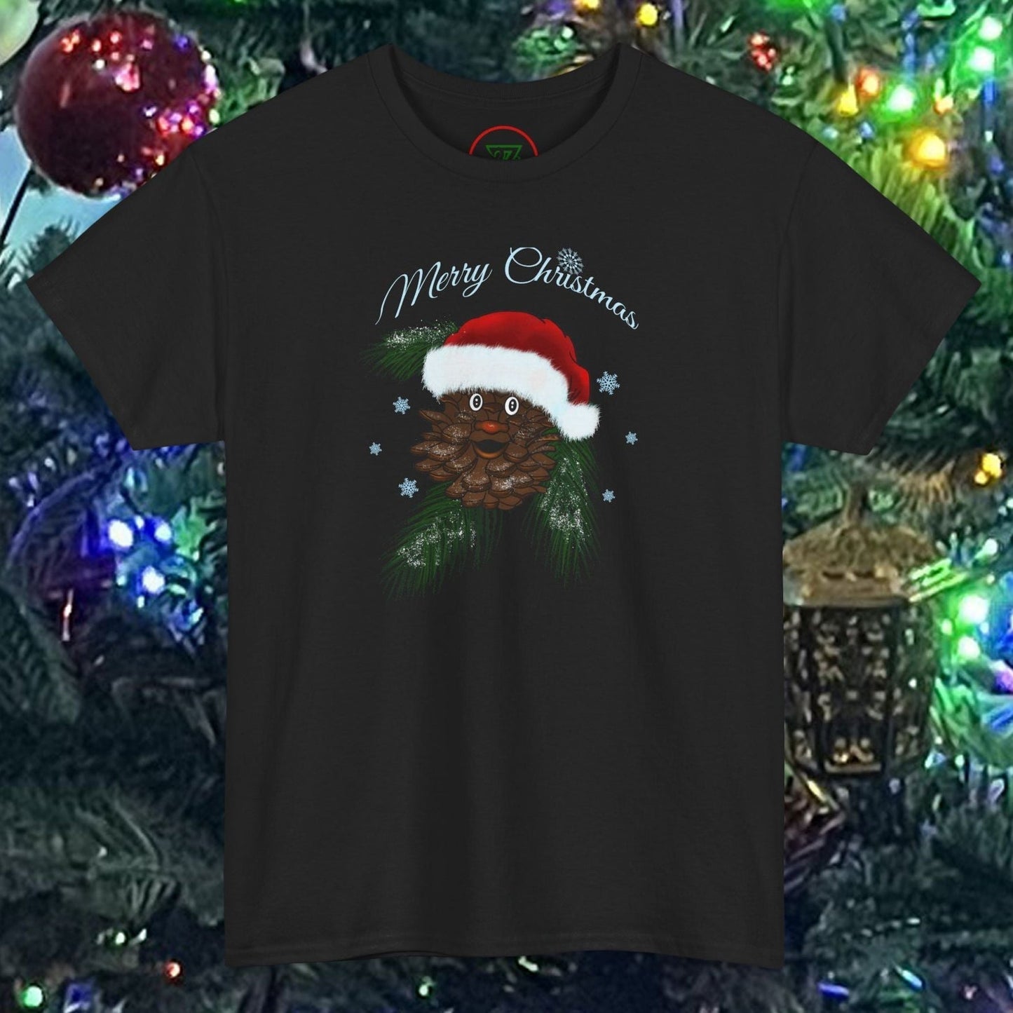 Black unisex Santa Pinecone Tee with hand-drawn pinecone wearing Santa hat and "Merry Christmas" text, festive holiday design