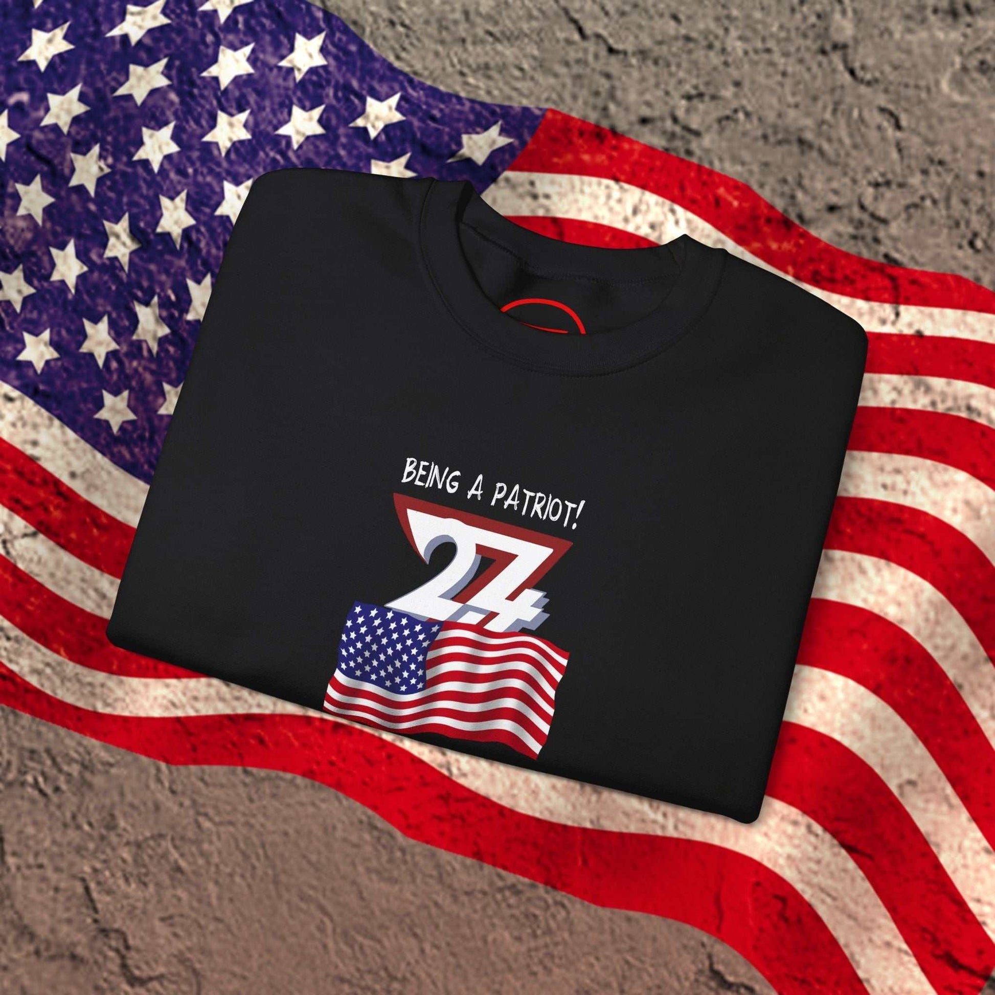 Folded black American Flag Patriot Sweatshirt with a hand-drawn US flag design on an American flag background