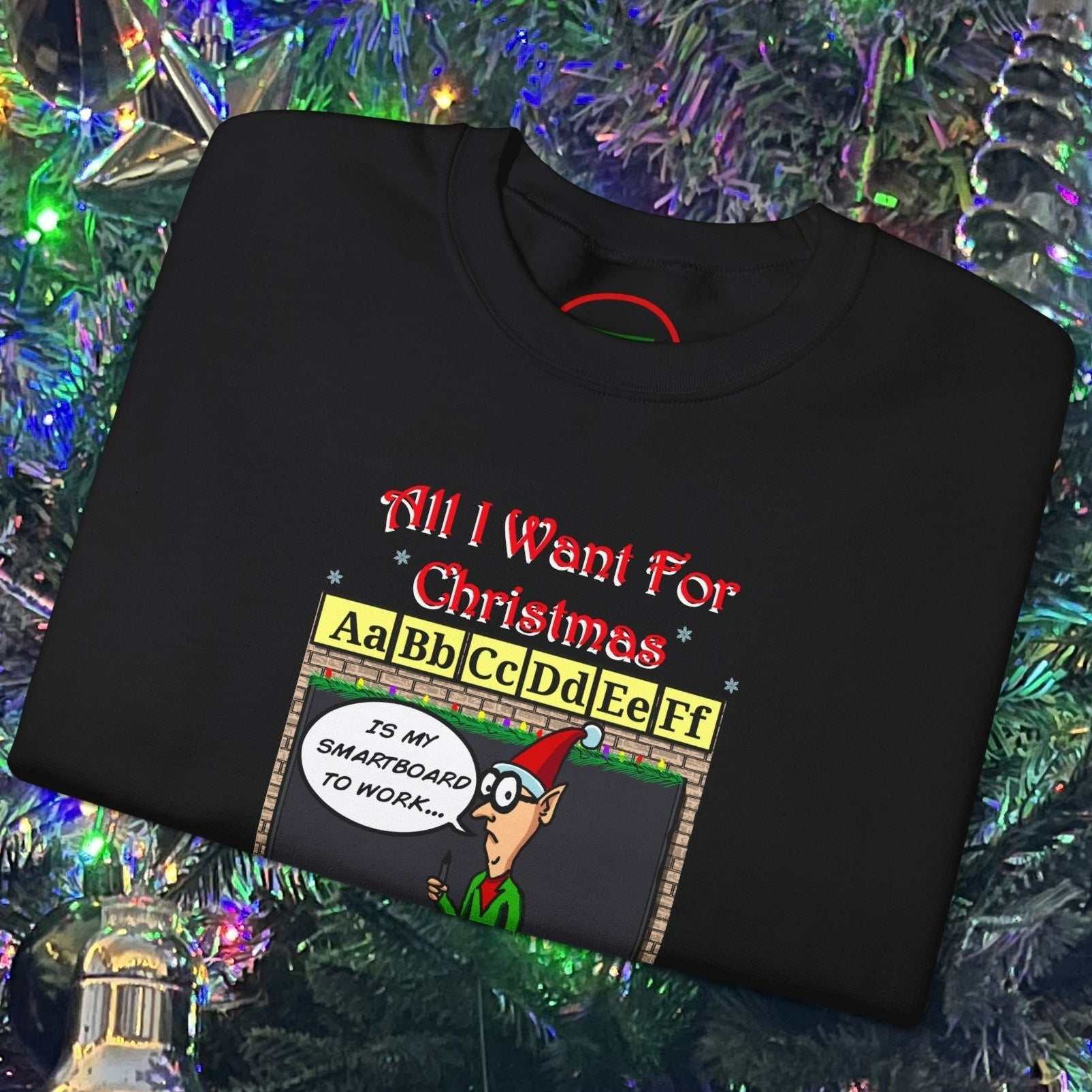 Funny cartoon teacher Christmas sweatshirt with humorous holiday design on black fabric