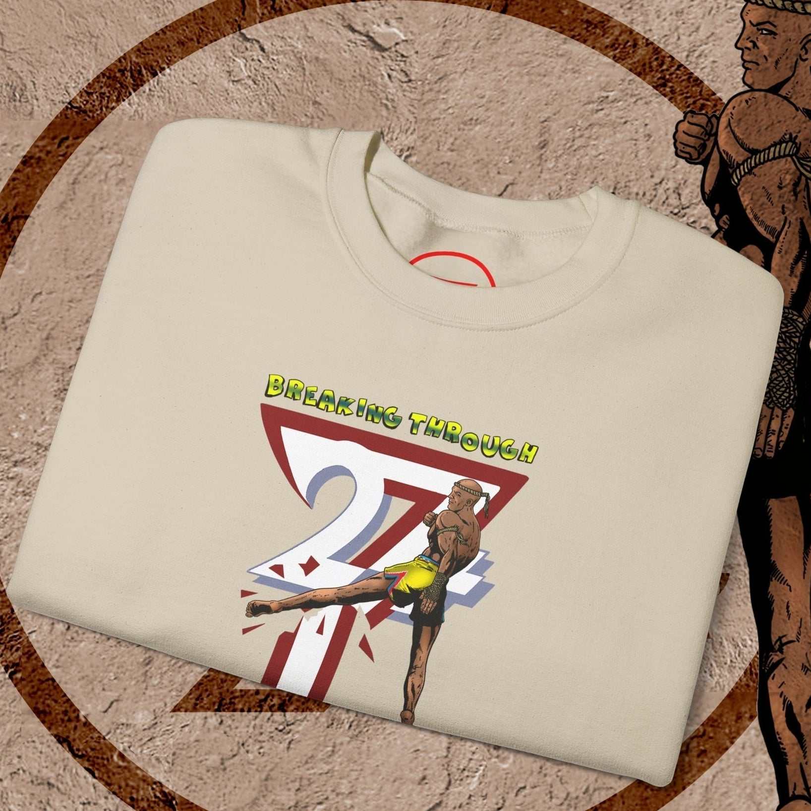 Muay Thai sweatshirt with hand-drawn combat fighter design and "Breaking Through" text on cream fabric