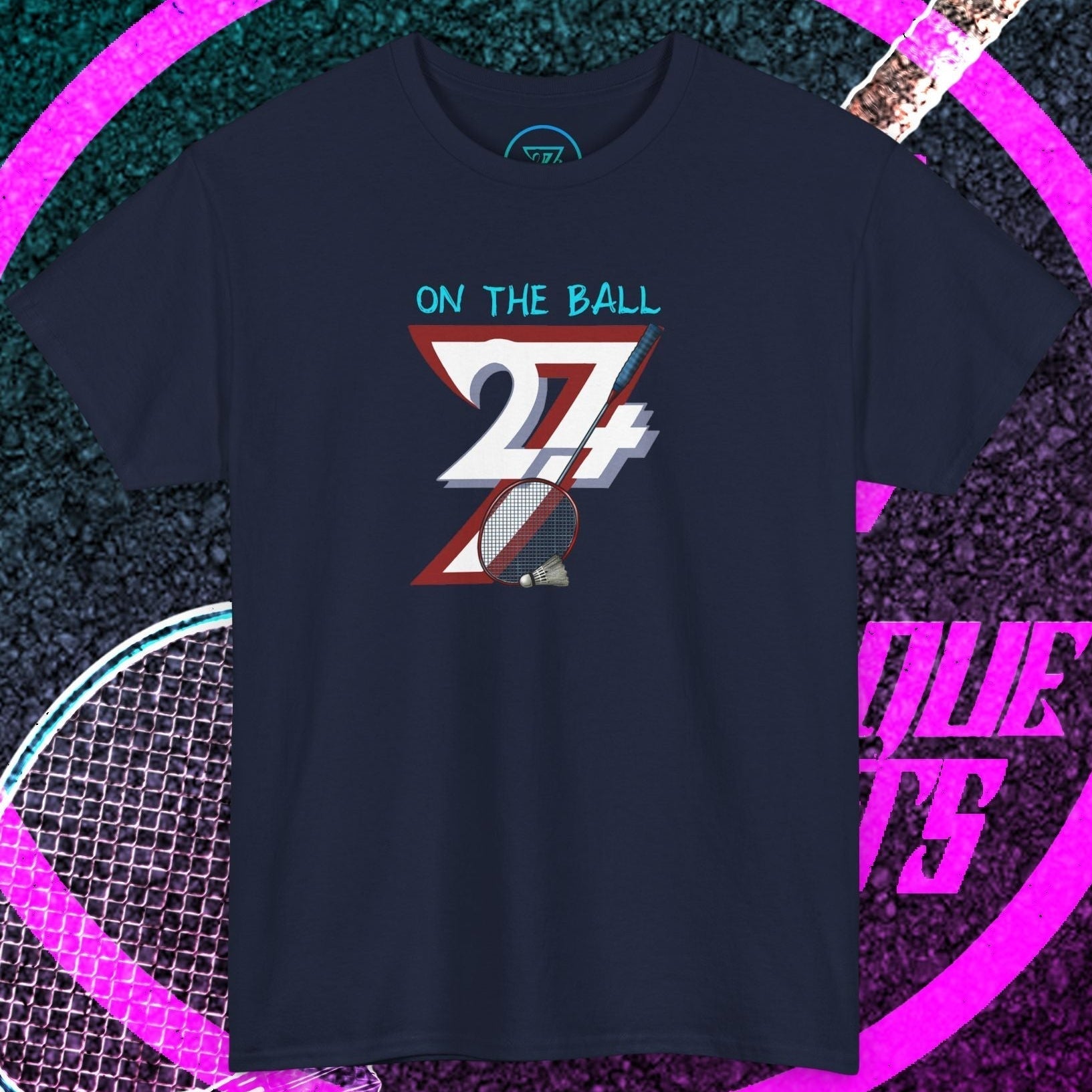 Navy blue badminton hand-drawn graphic tee with "On The Ball" text and sketch-style shuttlecock design.