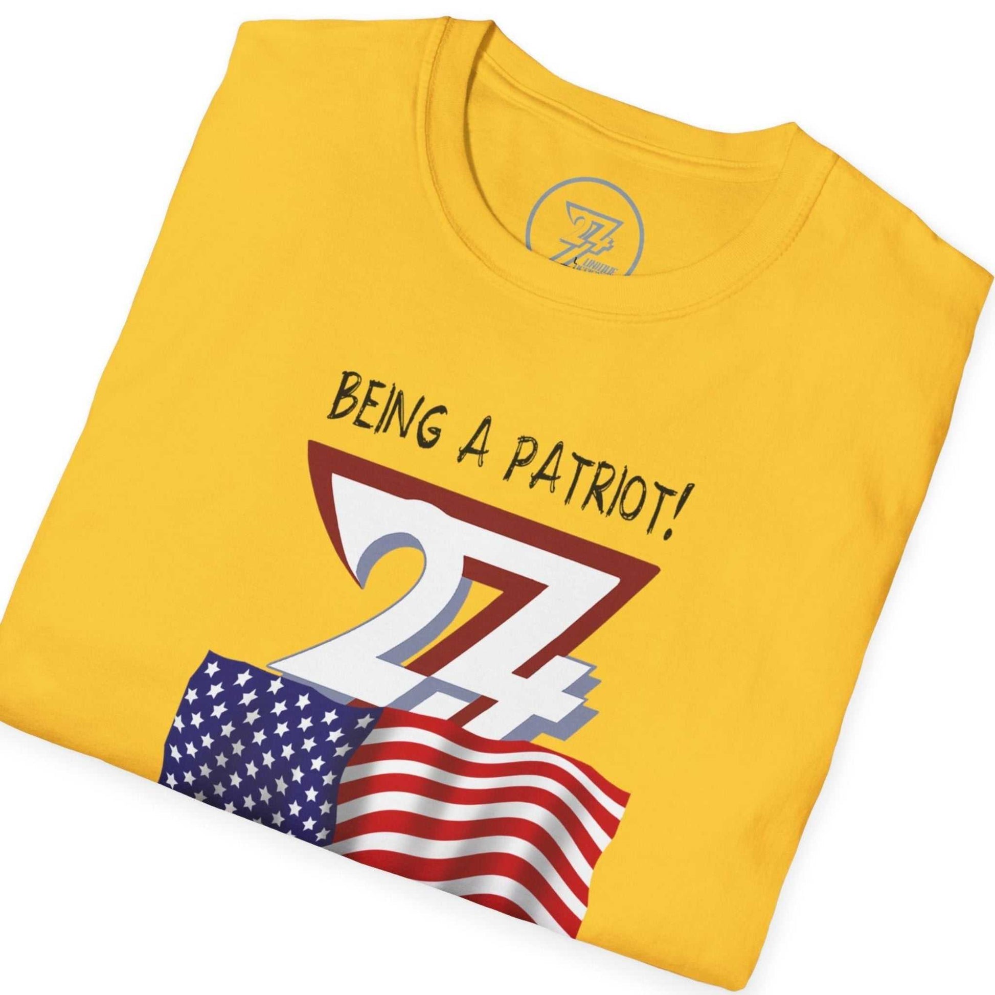 Folded Yellow USA t-shirt with 'Being a Patriot!' text and American flag design on a white background