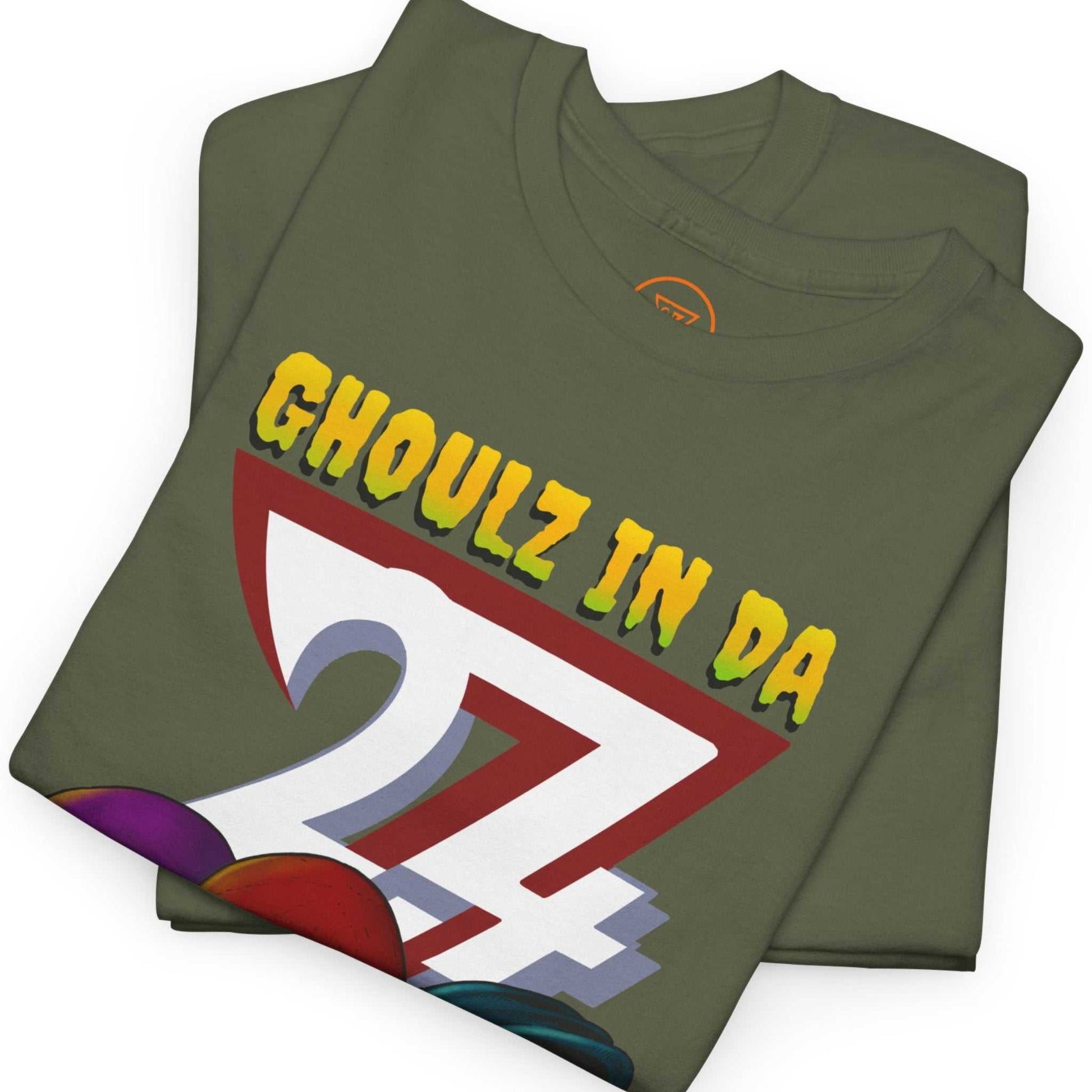 Neatly folded army green heavy cotton tee showing the classic unisex fit and spooky comic style aesthetic.