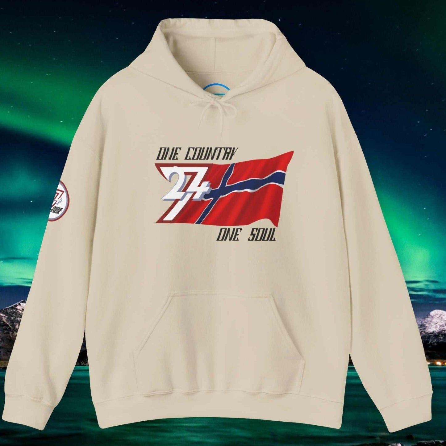 A polished Beige Norge flag hoodie with our signature hand-drawn art and "One Country One Soul" text.