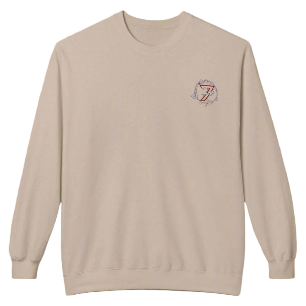 Beige relaxed fit crewneck jumper displaying an original floral art print.
