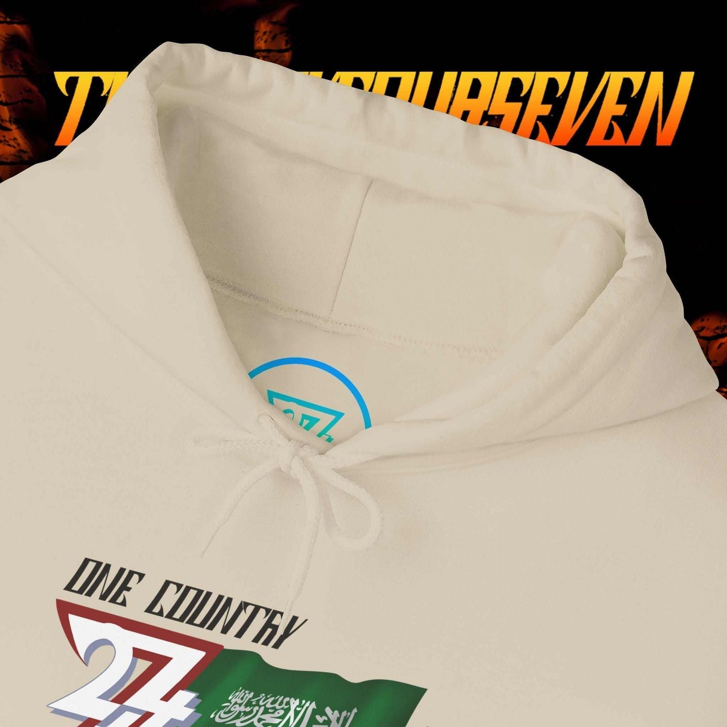 Macro close-up of the inner neck area showing the tear-away label and authentic 24/7 Unique Designs trademark logo.