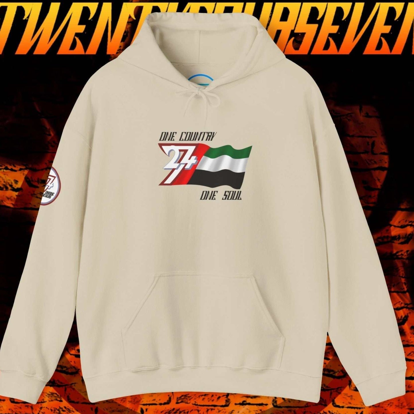 A polished Beige UAE flag hoodie with our signature hand-drawn art and "One Country One Soul" text.