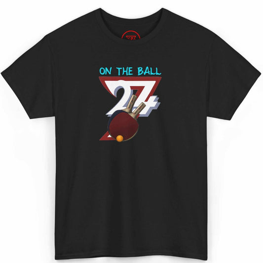 Front view of a sleek black 90s table tennis shirt highlighting the vibrant On The Ball graphic, displayed on a clean background.