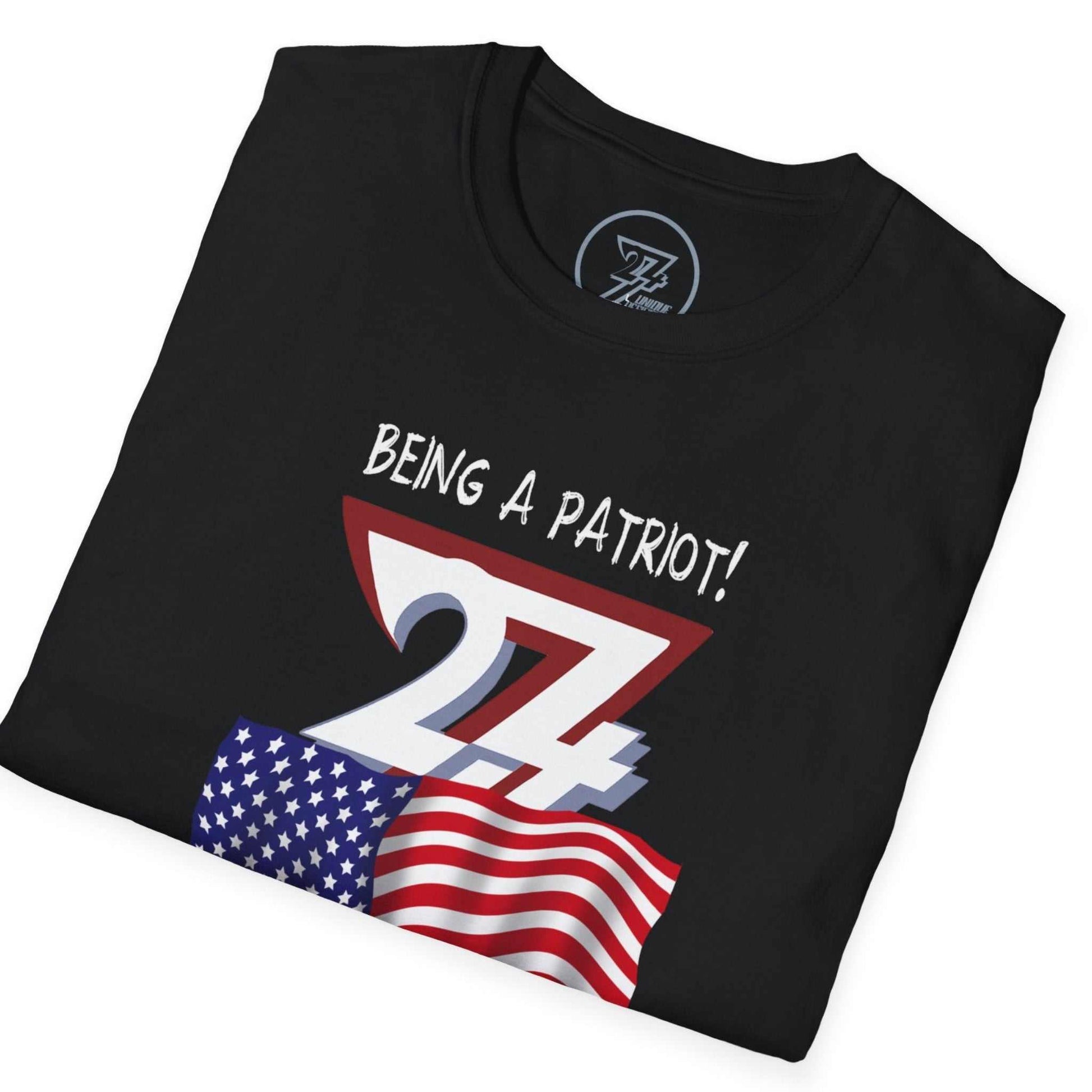 Neatly folded black American patriot flag t-shirt showing the premium cotton fabric and part of the vibrant flag print, laid flat.