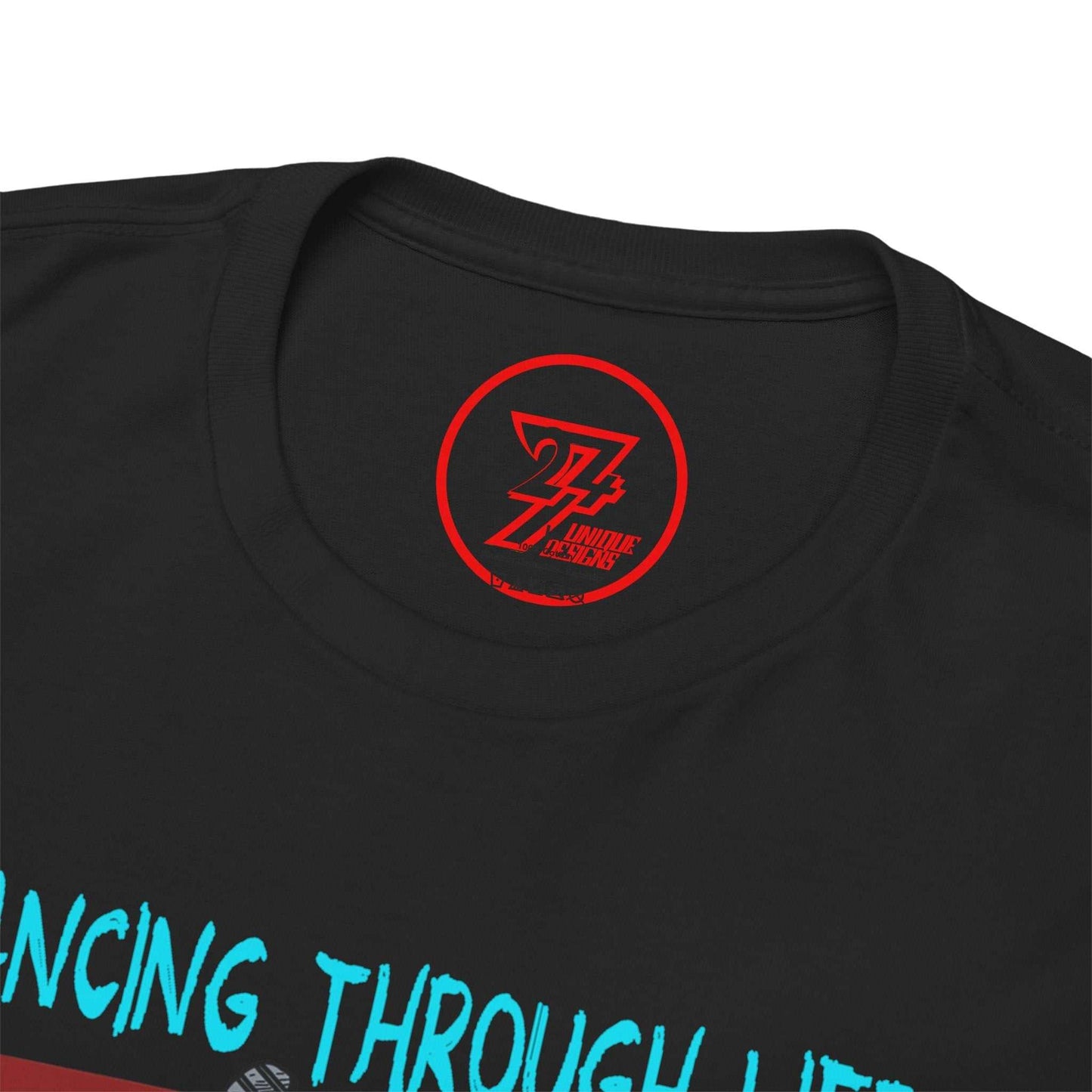 Close-up of the seamless crew neckline on the black dance shirt, clearly showing the official 24/7 Unique Designs trademark logo inner label branding.