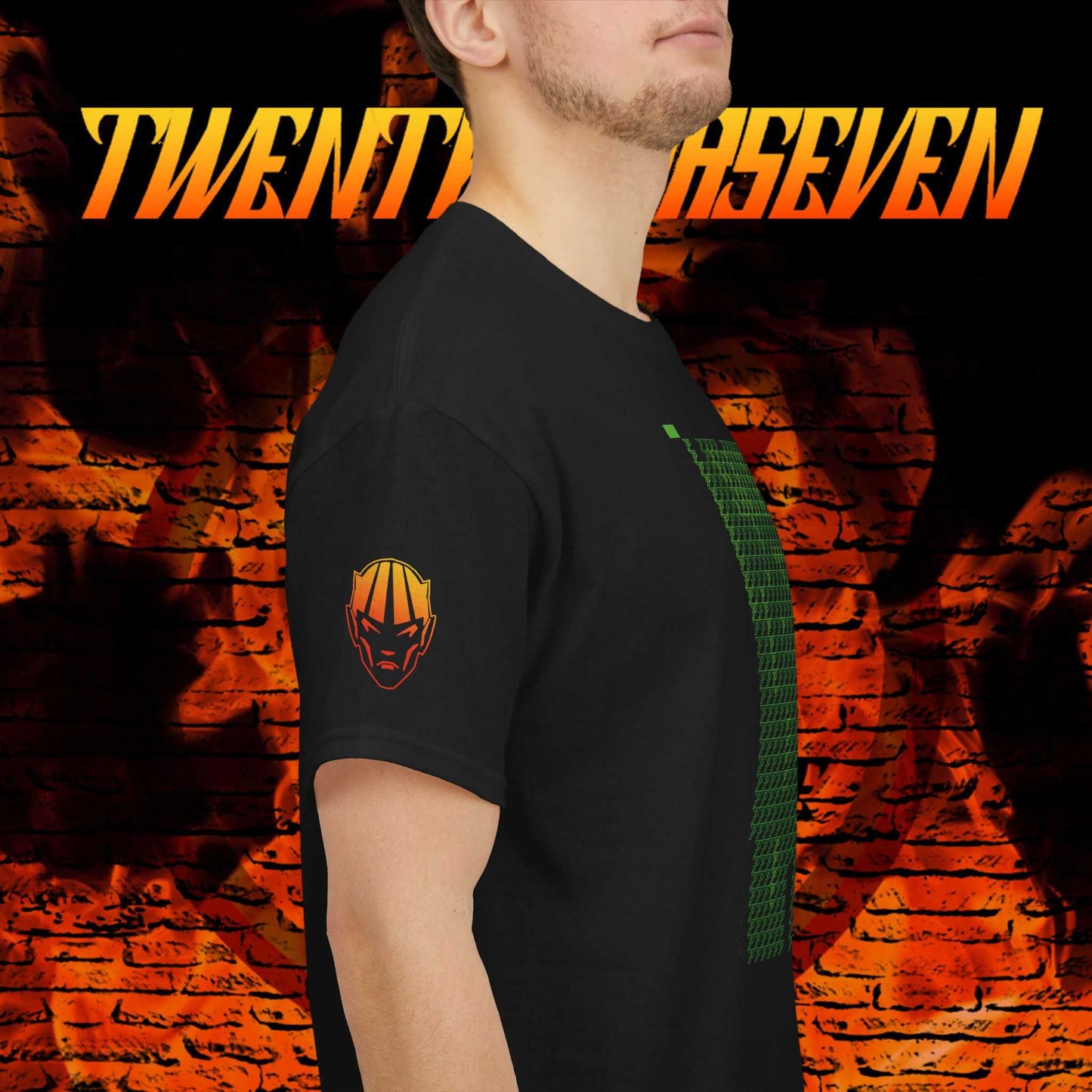 Dedicated close-up shot of the right sleeve of the black t-shirt, clearly showing the intricate silhouette of the Dablo comic character used as an exclusive artist emblem.