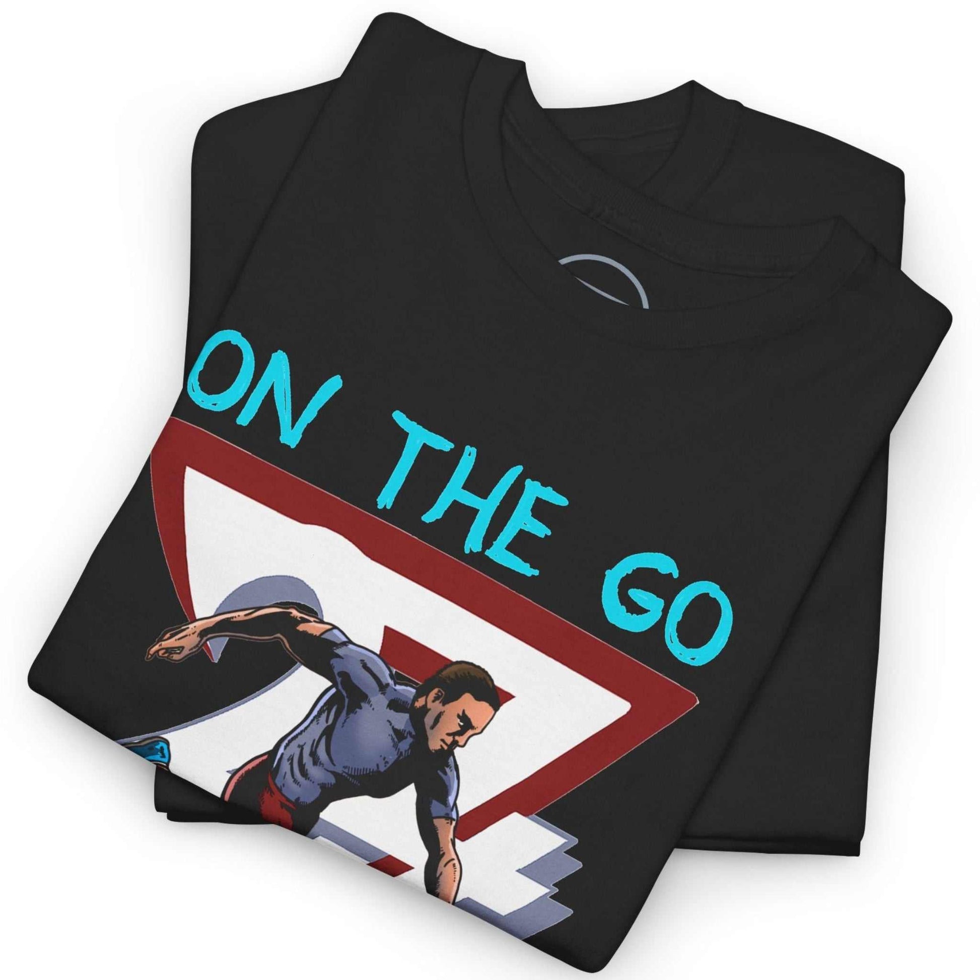 Neatly folded black marathon training shirt highlighting the crisp comic-style front print and premium fabric, laid flat.