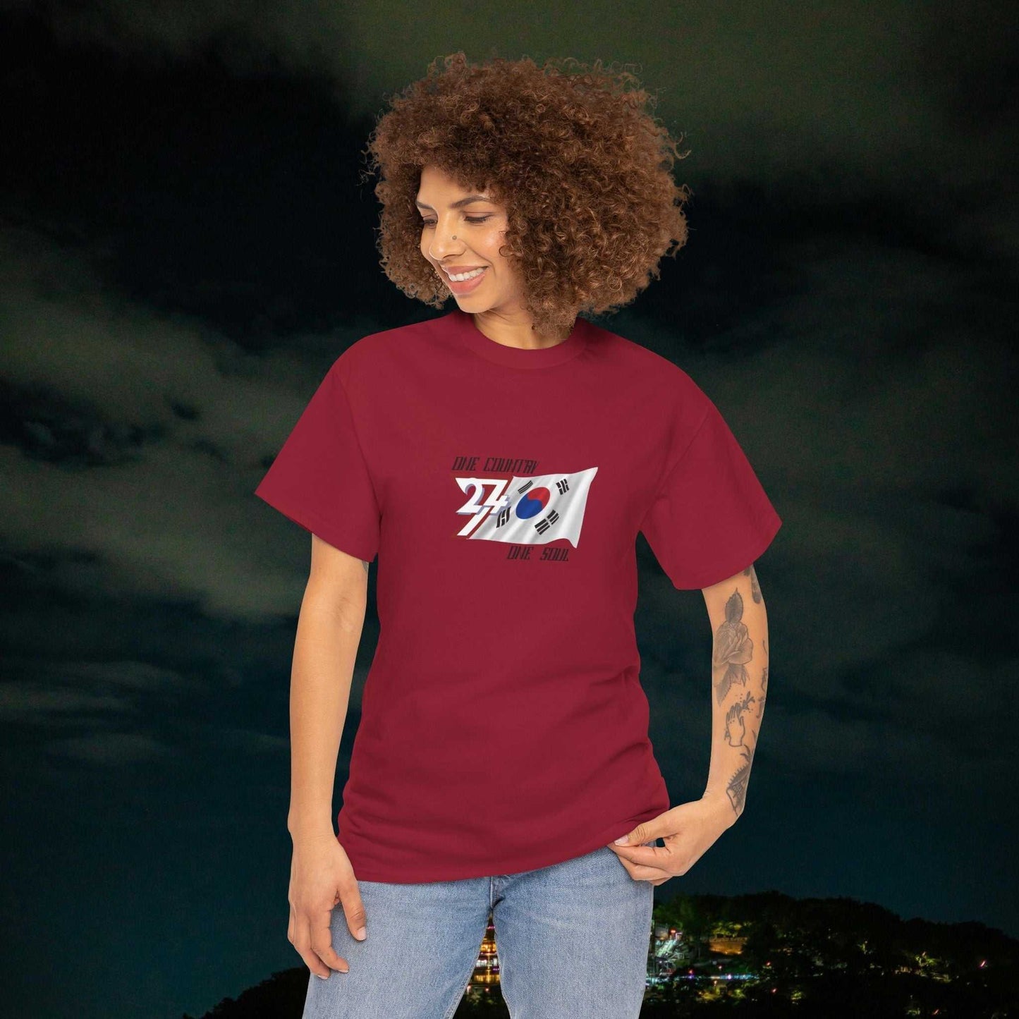 Woman wearing maroon South Korea flag graphic tee with hand-drawn Taegeukgi design on front