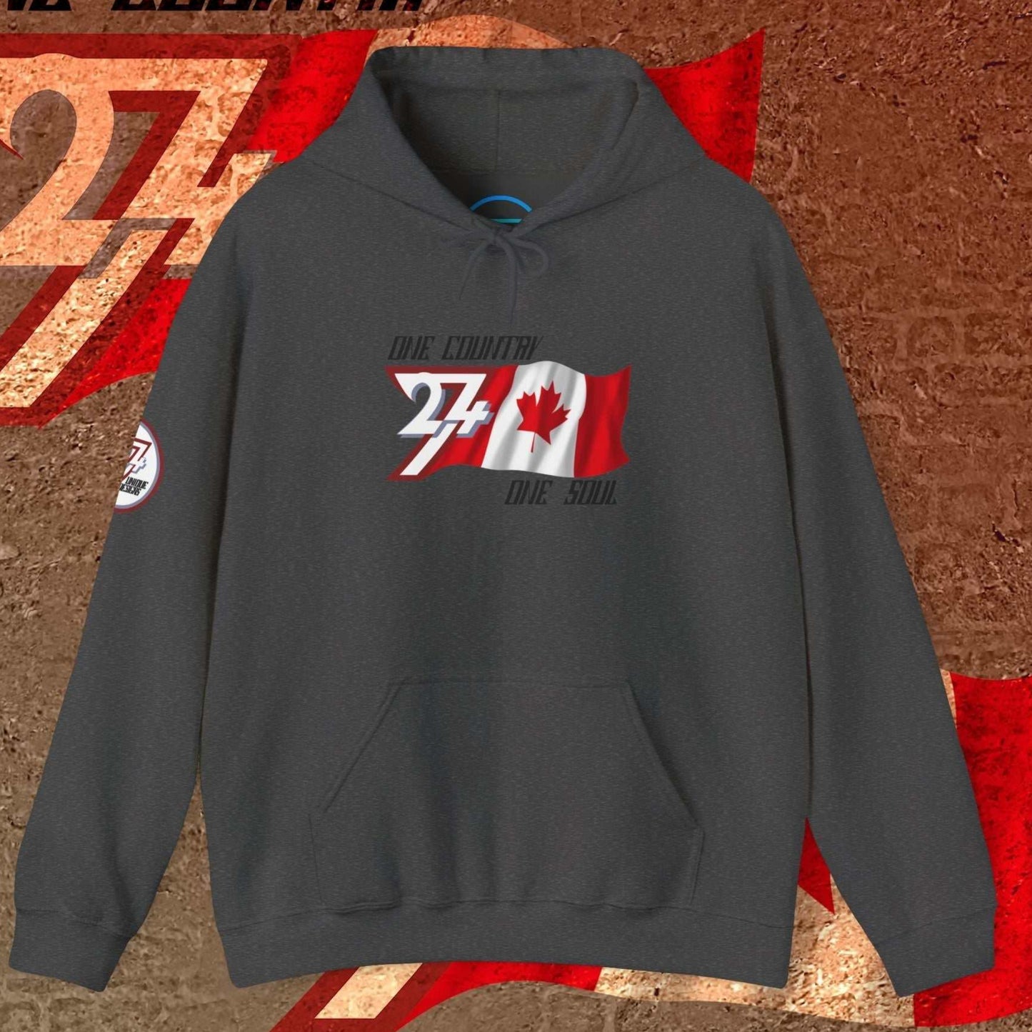 Charcoal Canada hoodie with hand-sketched maple leaf and 24/7 "One Country One Soul" passion motto.