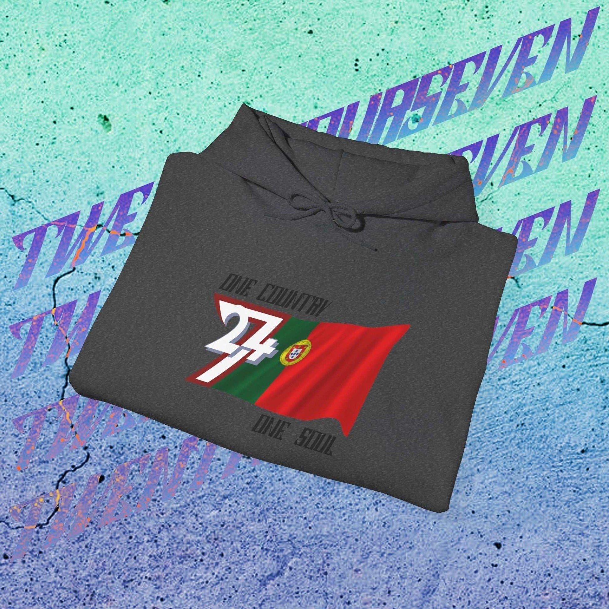 A professional display of the Portugal flag hoodie in Charcoal, folded to showcase the refined hand-drawn graphic and 8oz fabric weight.