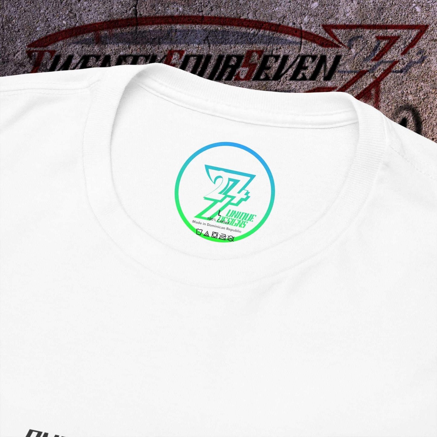 Close-up view of a white Japan flag tee showing the trade mark 24/7 Unique Designs logo