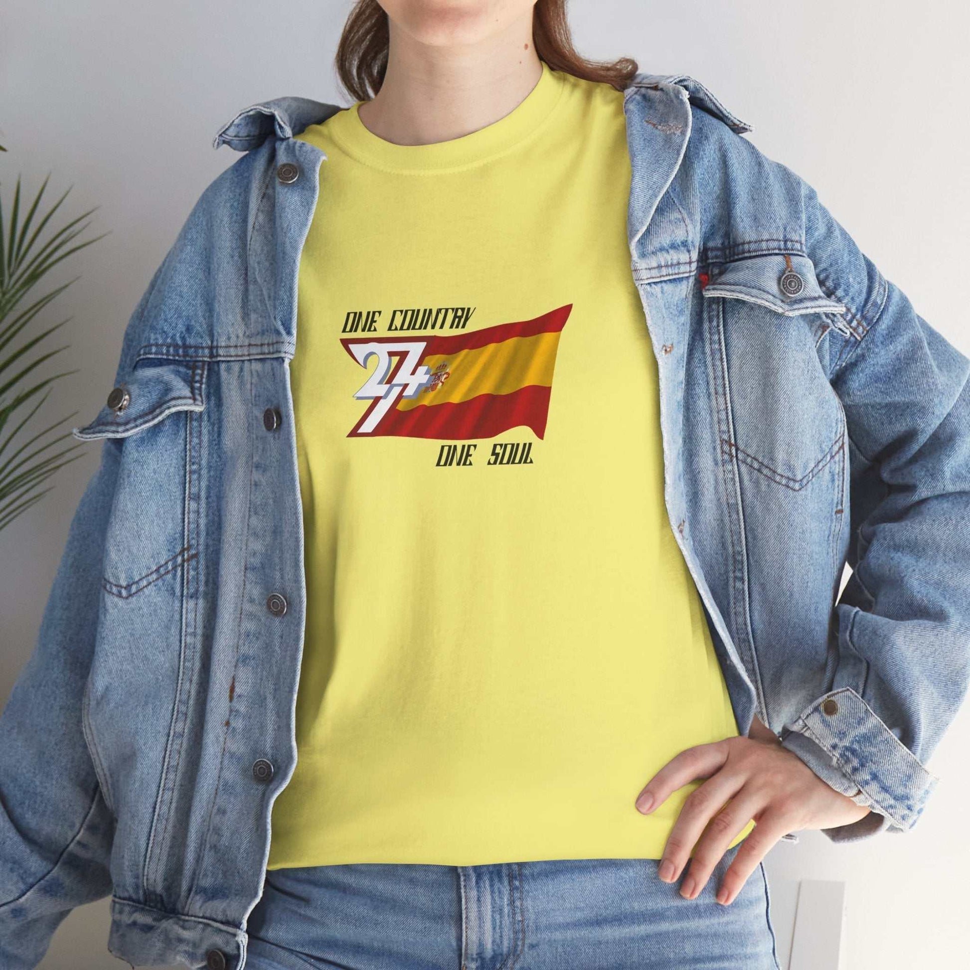 Unisex yellow Spain flag graphic tee with hand-drawn design, worn under denim jacket