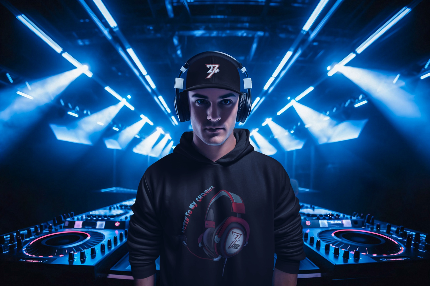 DJ wearing the black embroidered logo baseball hat and head set design hoodie