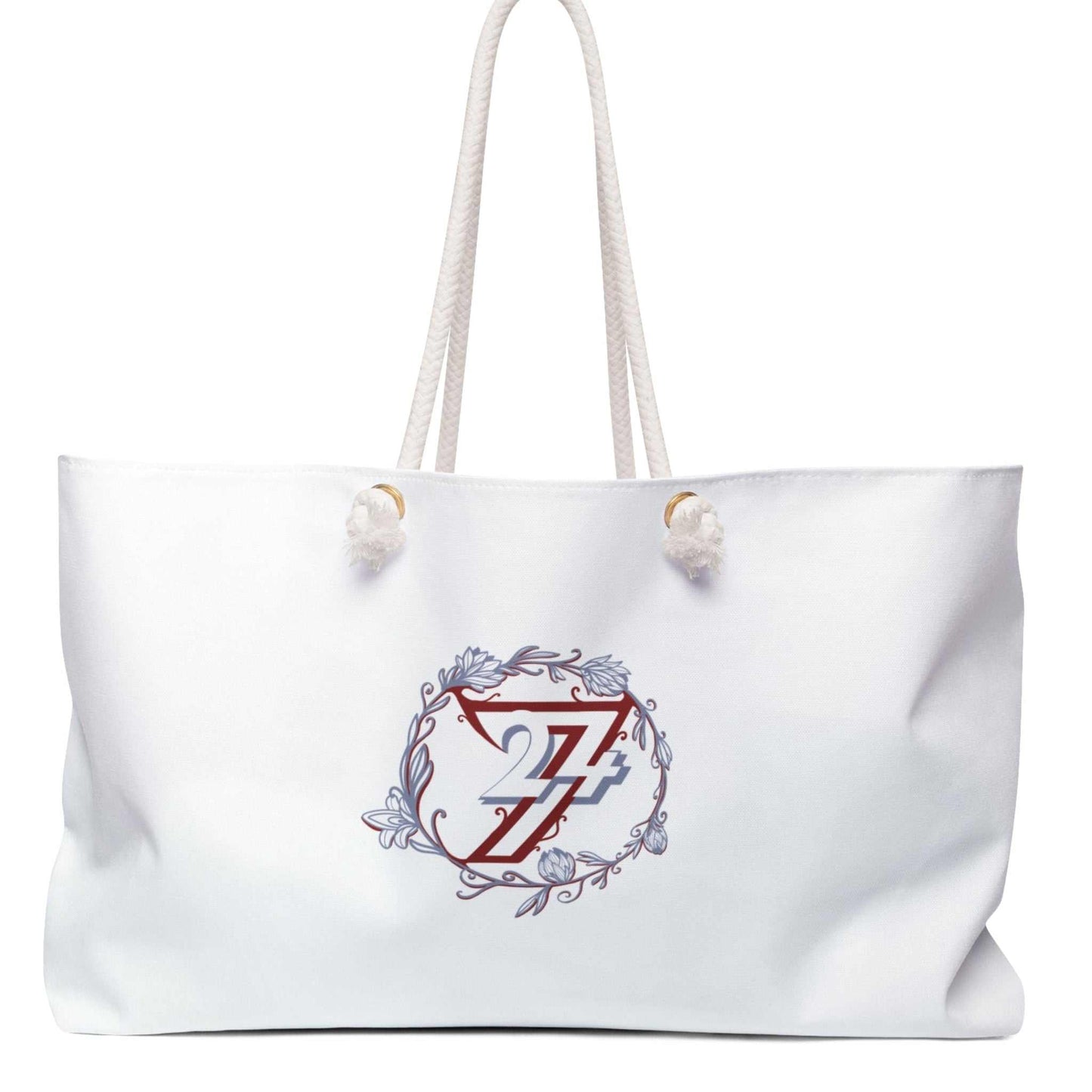 Front view of the white elegant floral weekender tote bag featuring the hand-drawn red and blue 24/7 floral wreath graphic, displayed on a clean white background.