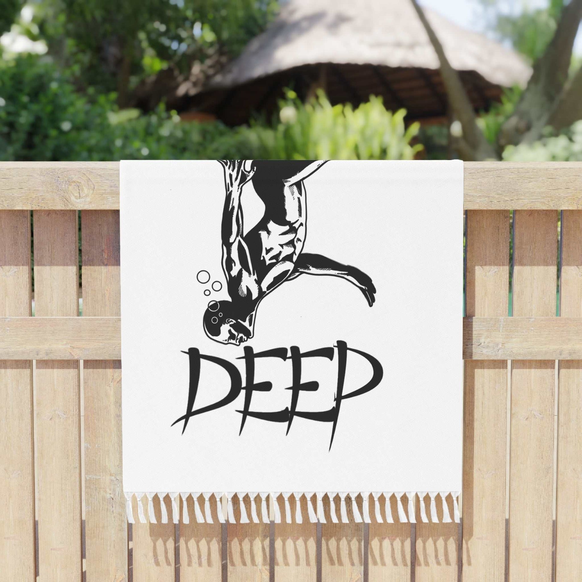 Swimming towel bLarge white fringed beach towel featuring a high-contrast black ink illustration of a diver and bold DEEP typography.each towel created by 24/7 Unique Designs folded