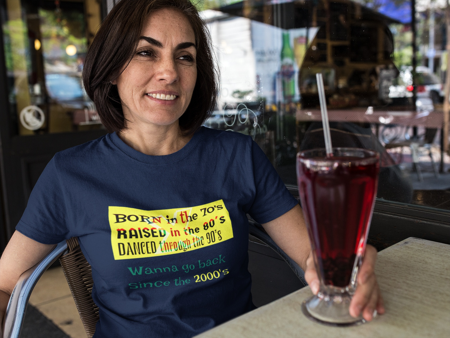 Female model demonstrating the classic unisex fit of the navy blue 24/7 Unique Designs nostalgic shirt.