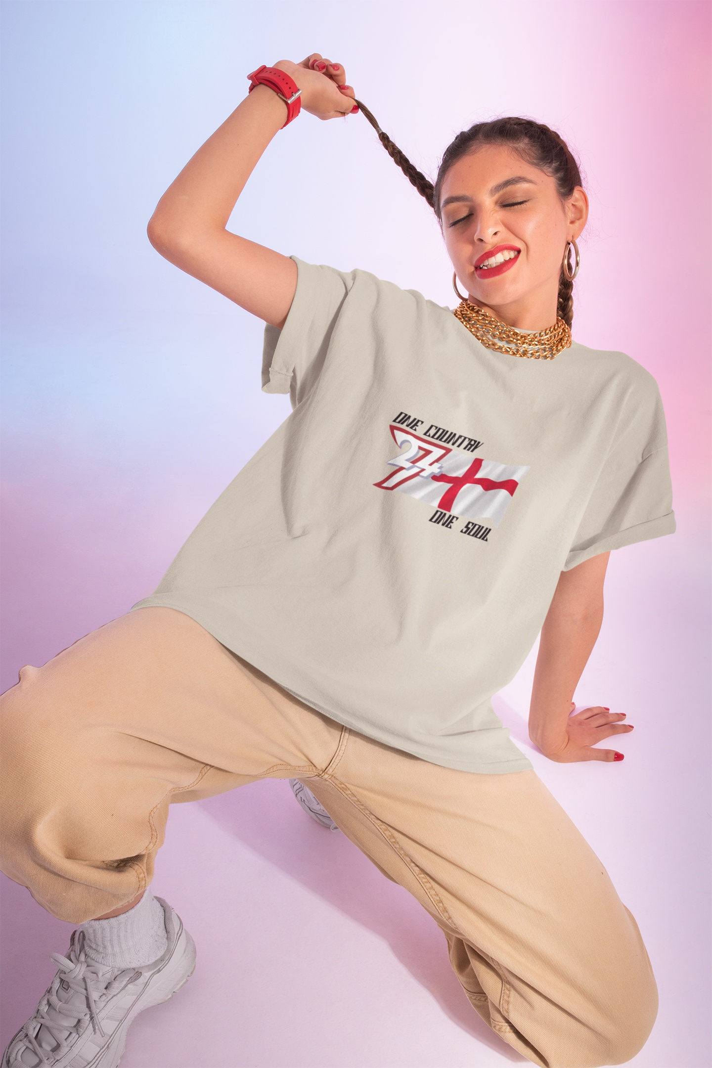Beige England flag t-shirt showcasing the hand-drawn "Valor" edition artwork on female model
