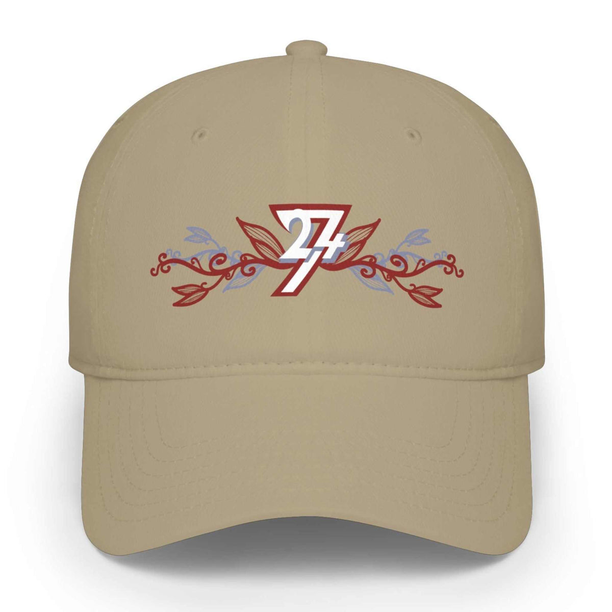 A beige floral baseball cap featuring a front graphic with a stylized white and red number 24/7, red leaf flourishes, and light blue decorative accents, shown on a clean white background.