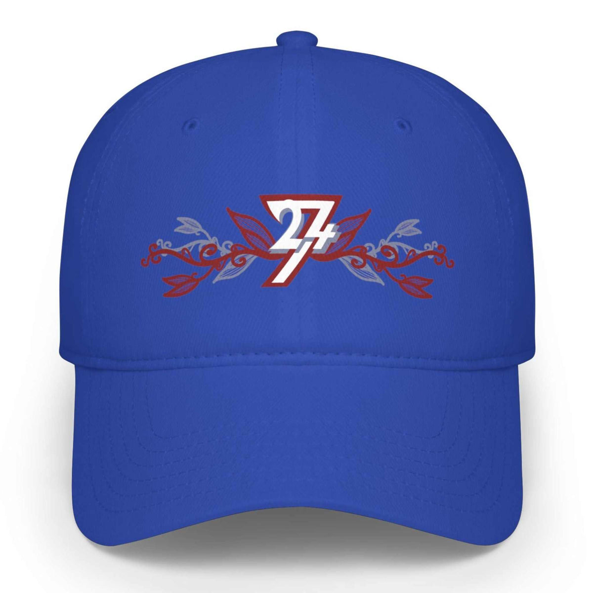 A royal blue floral embroidered baseball cap featuring a front graphic with a white and red 24/7 logo over red and gray floral scrollwork, shown on a clean white background.
