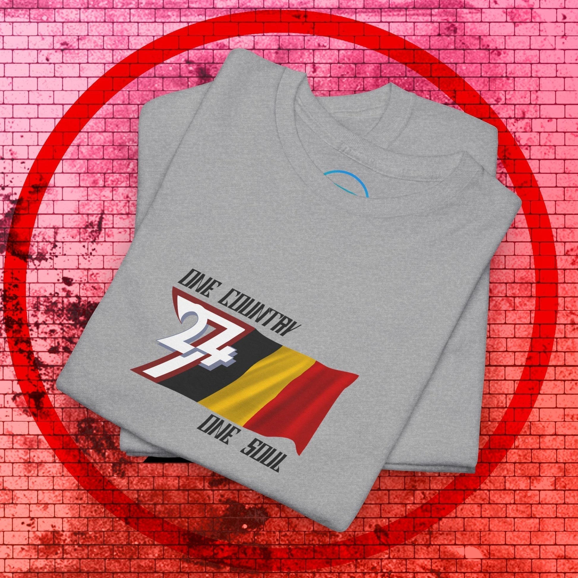 A professional display of the Belgium flag t-shirt in Sport Gray, folded to showcase the refined hand-drawn graphic and high-quality fabric finish.