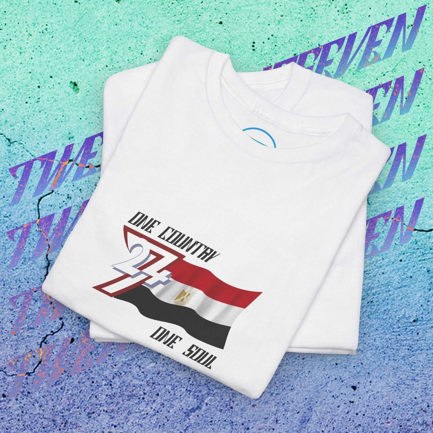 A professional display of the Egypt flag t-shirt in White, folded to showcase the refined hand-drawn graphic and high-quality fabric finish.
