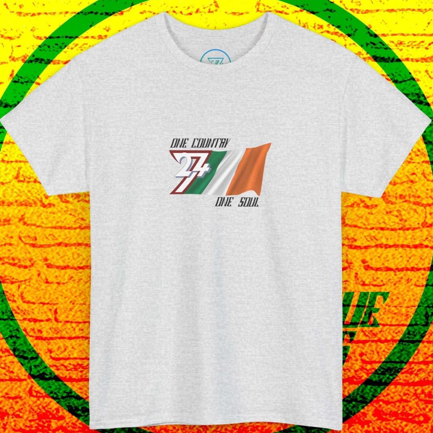 A full front-facing view of the ash Ireland flag t-shirt, showcasing the artist's hand-drawn tricolor and "One Country One Soul" slogan.