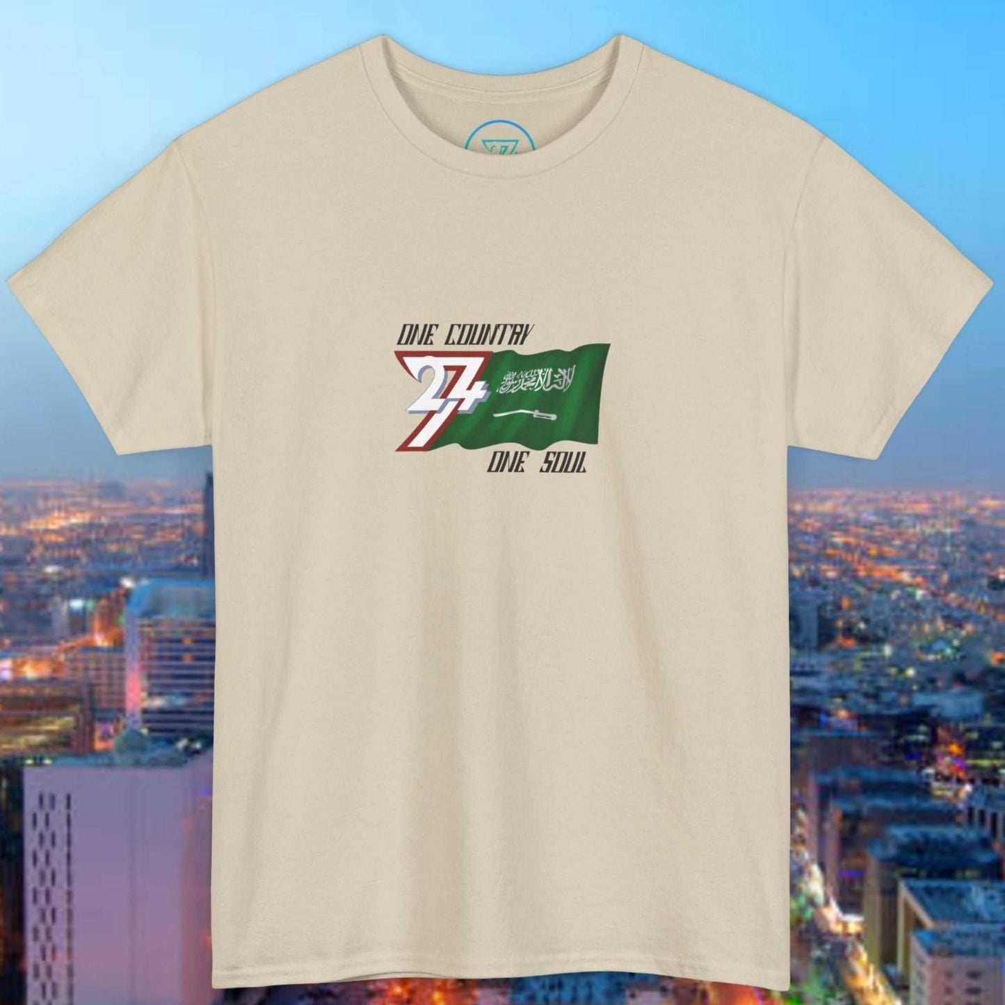 Hand-drawn Saudi Arabia flag graphic on beige unisex cotton tee honoring heritage