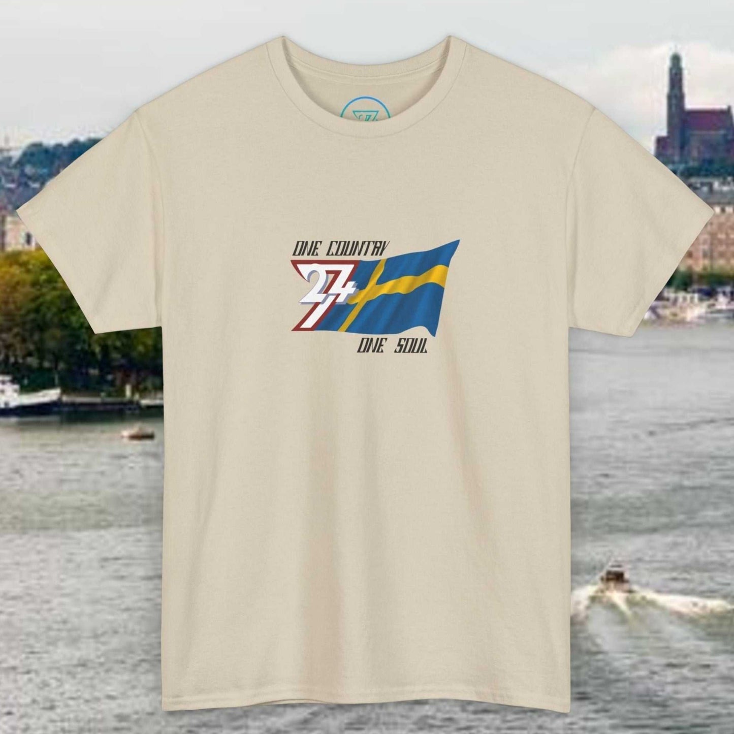 Unisex beige Sweden Flag Graphic Tee with hand-drawn Swedish flag and "Die Country Die Soll" text design
