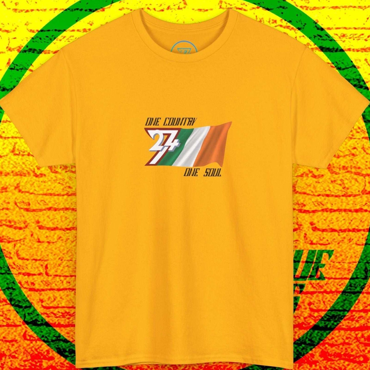 Main product image of the gold Ireland "Emerald" edition shirt, displaying the 24/7 original hand-drawn flag and slogan.