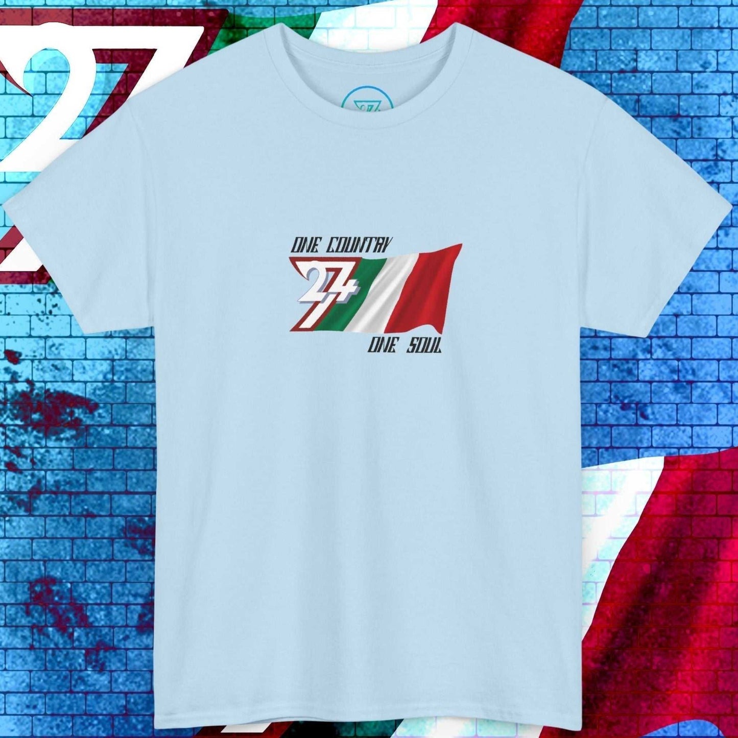 Hand-drawn Italian flag design on a light blue t-shirt featuring the "One Country One Soul" signature.