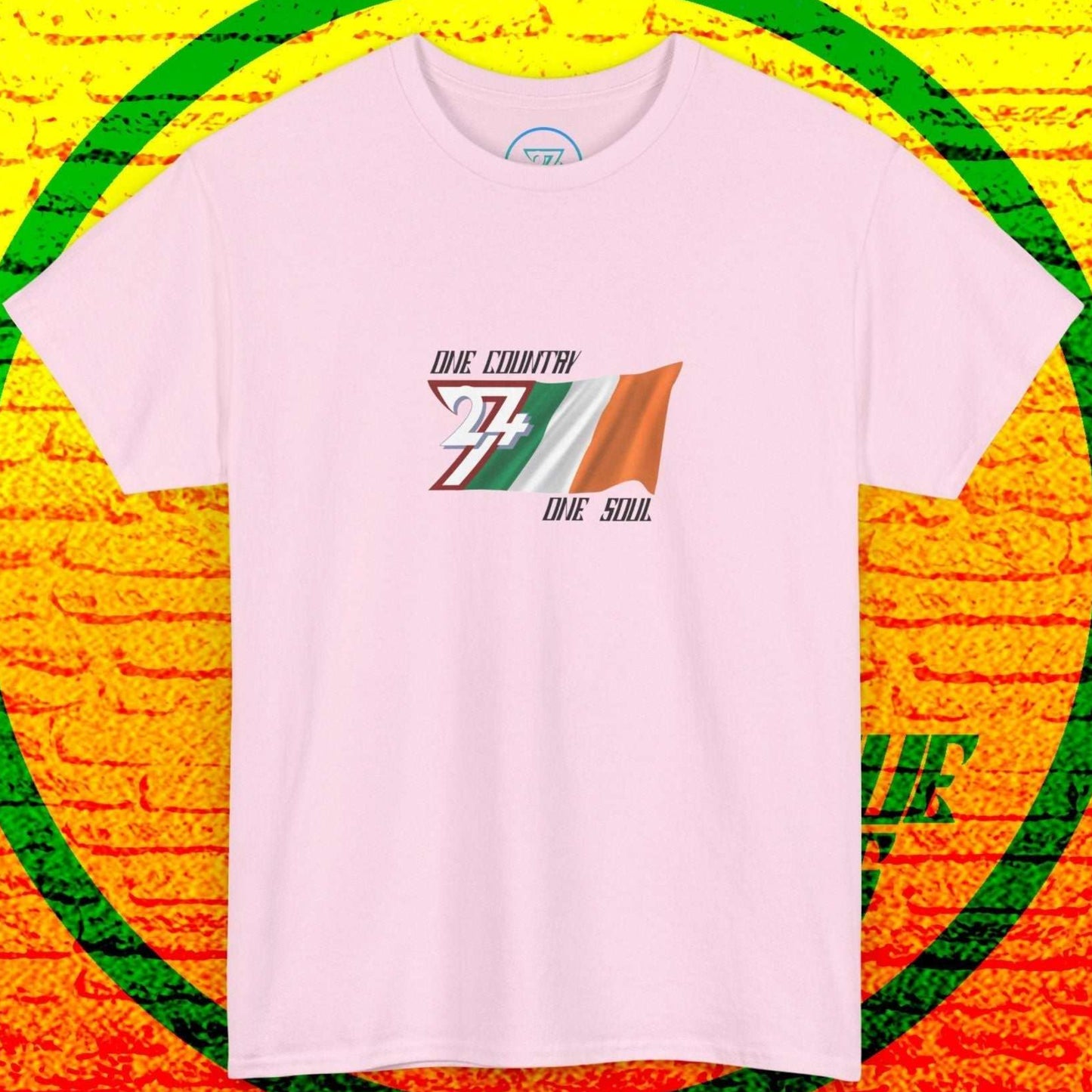 Full-view light pink t-shirt featuring the digitally illustrated Ireland national flag and the iconic "One Country One Soul" signature.