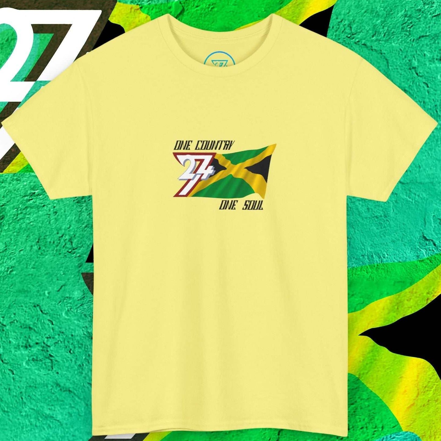 Digitally illustrated Jamaica graphic tee in cornsilk with original artist sketch-work and "One Country One Soul" text.