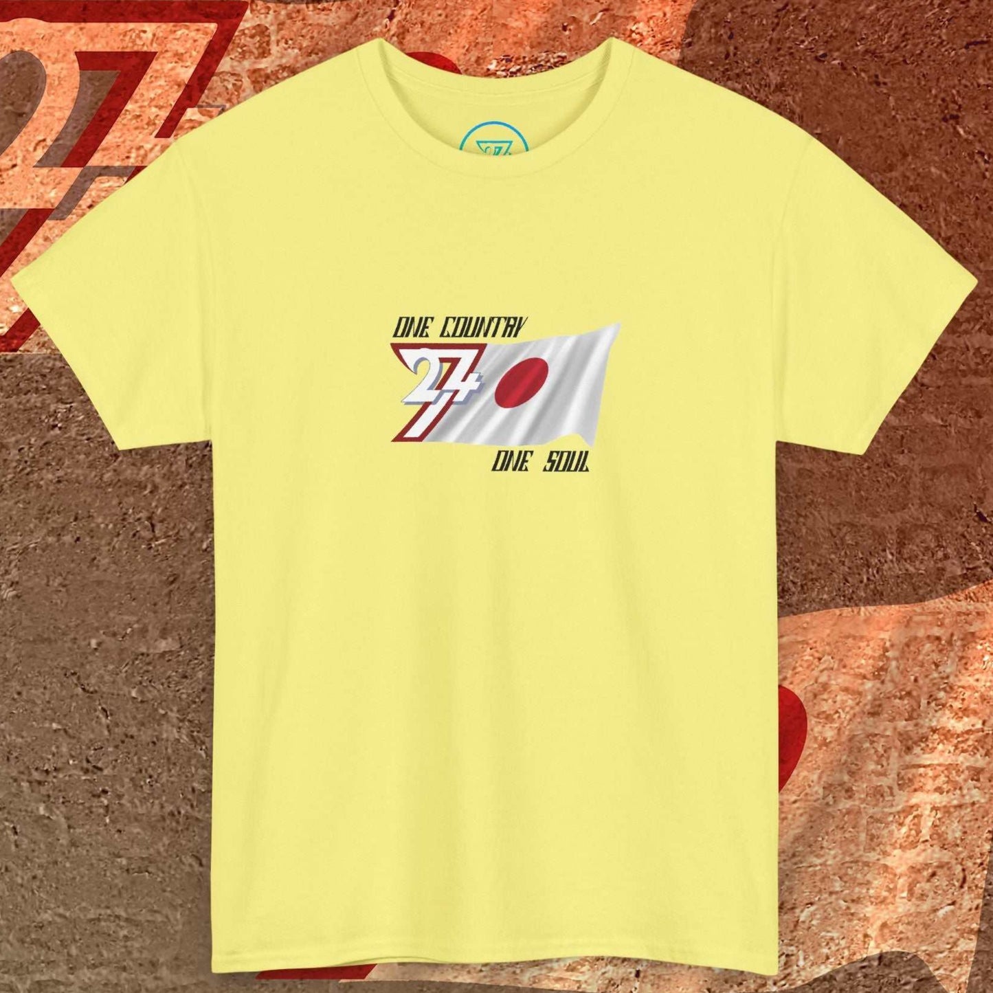 Front view of a light yellow Japan flag t-shirt featuring a hand-drawn red sun and the "One Country One Soul" slogan.