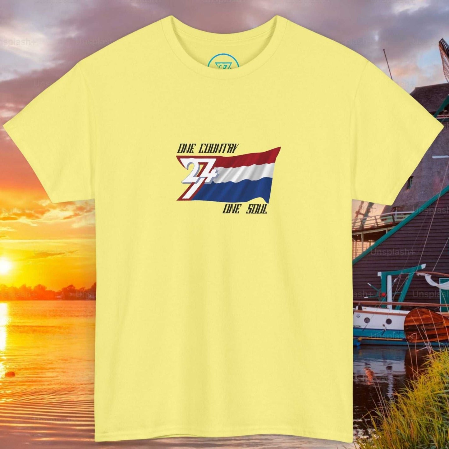 Front view of a light yellow graphic t-shirt featuring a digitally hand-drawn Netherlands flag design.