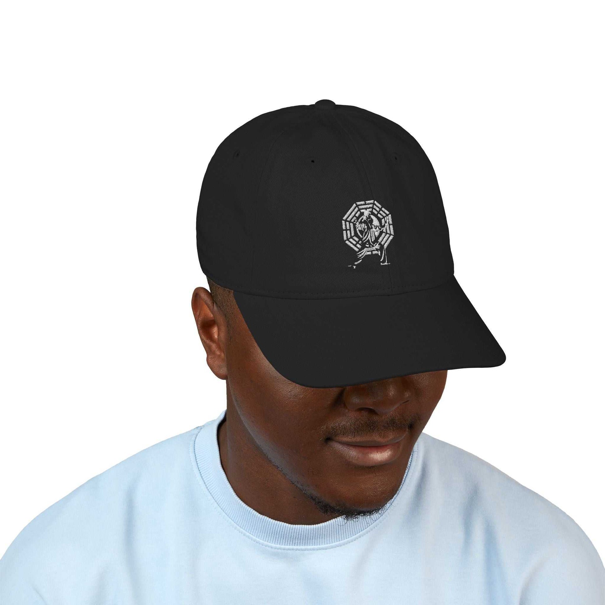 Black embroidered Tai Chi logo baseball cap on male model