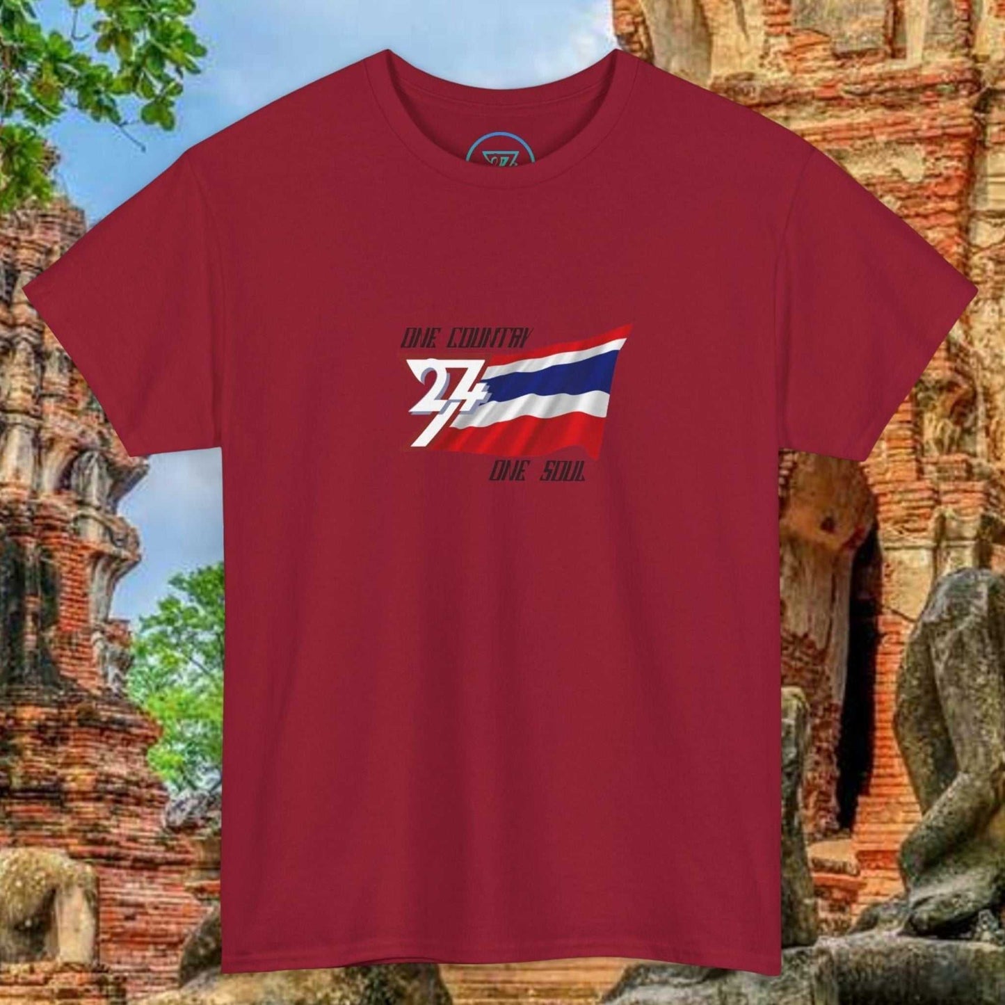 Red unisex Thailand Flag T-Shirt with hand-drawn Thong Trairong graphic on chest in historic temple setting