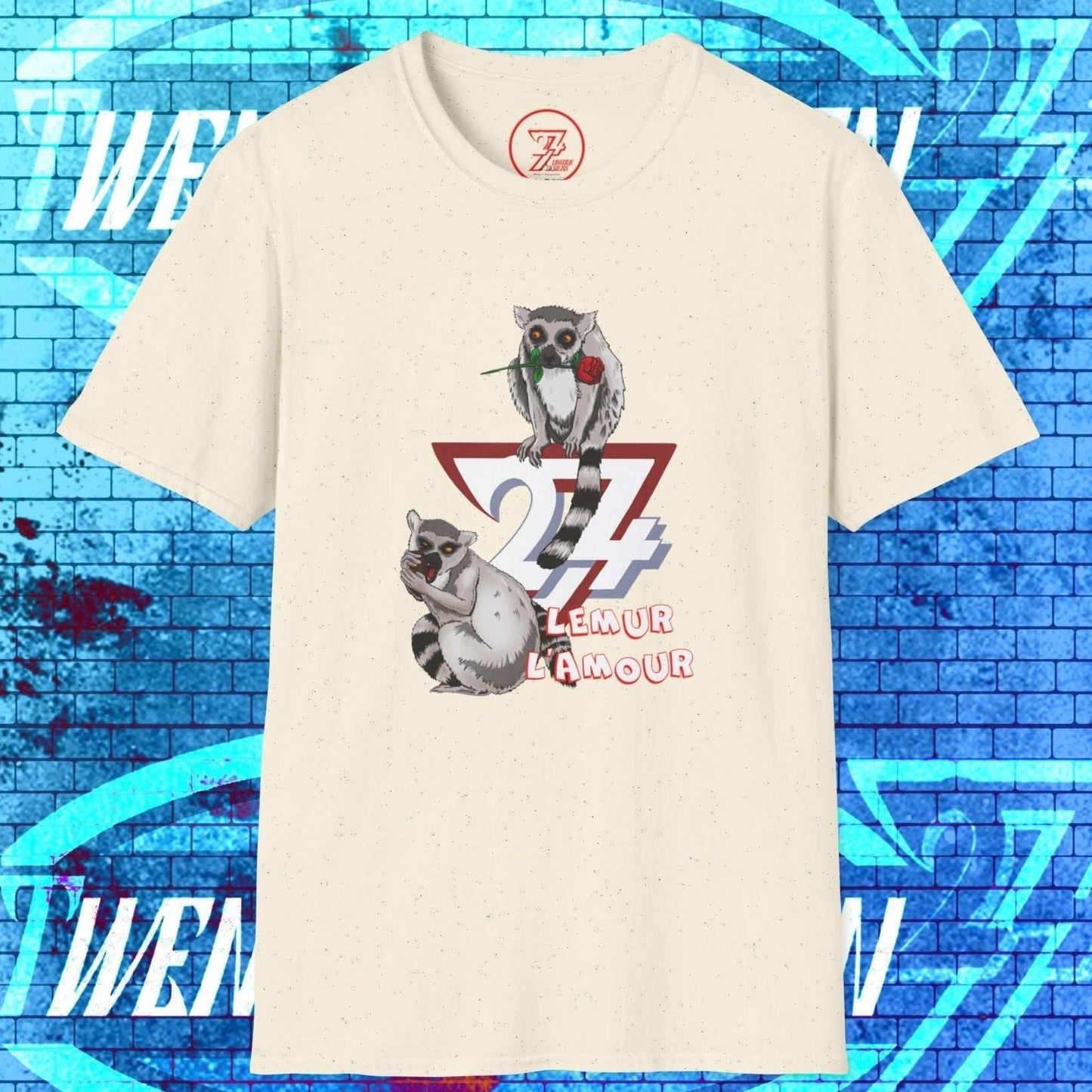 Artistic product shot of the beige Lemur L’Amour tee showing a sketched lemur with a rose and its partner eating.