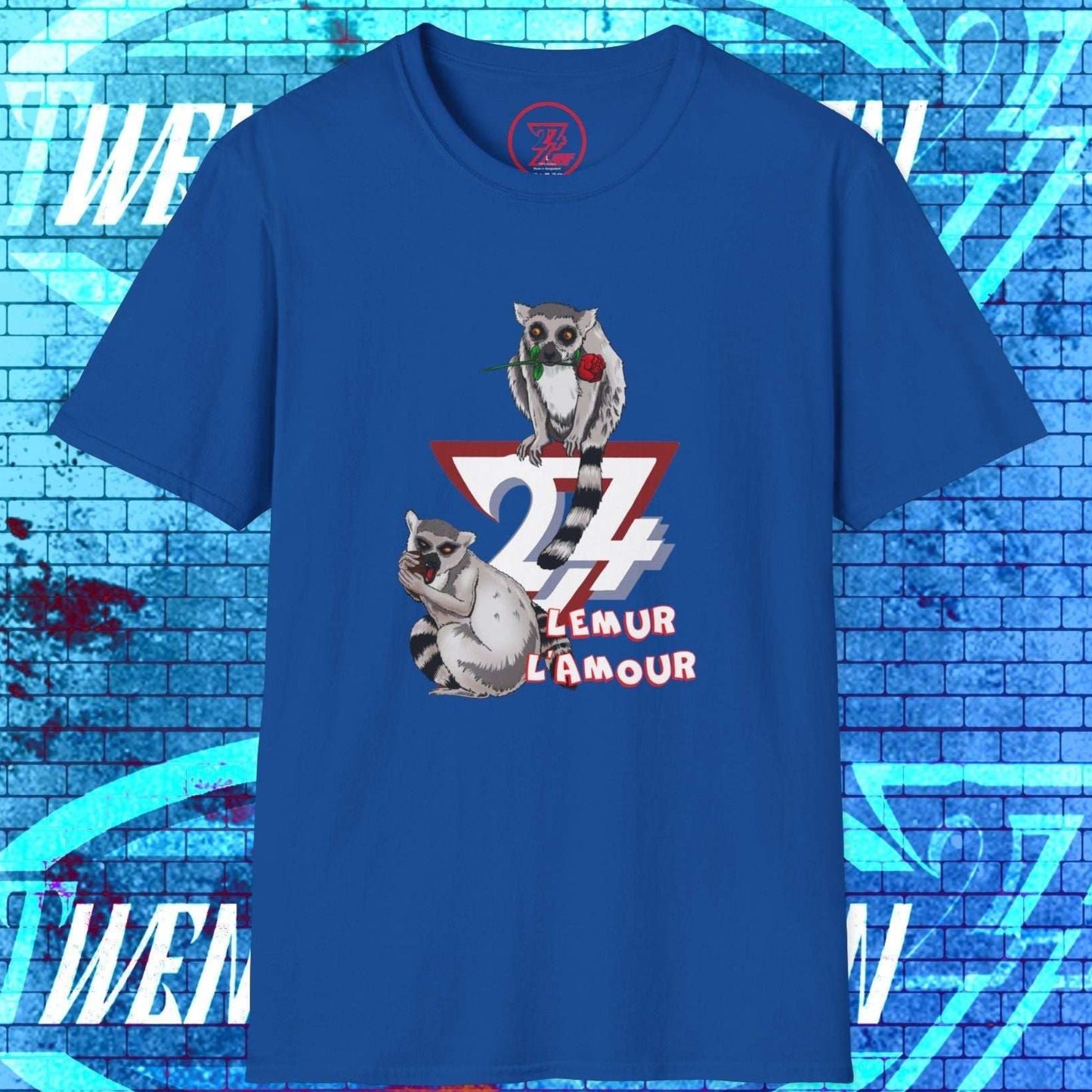 Clean front display of the royal blue Lemur L’Amour t-shirt with signature 24/7 branding and hand-sketched characters.