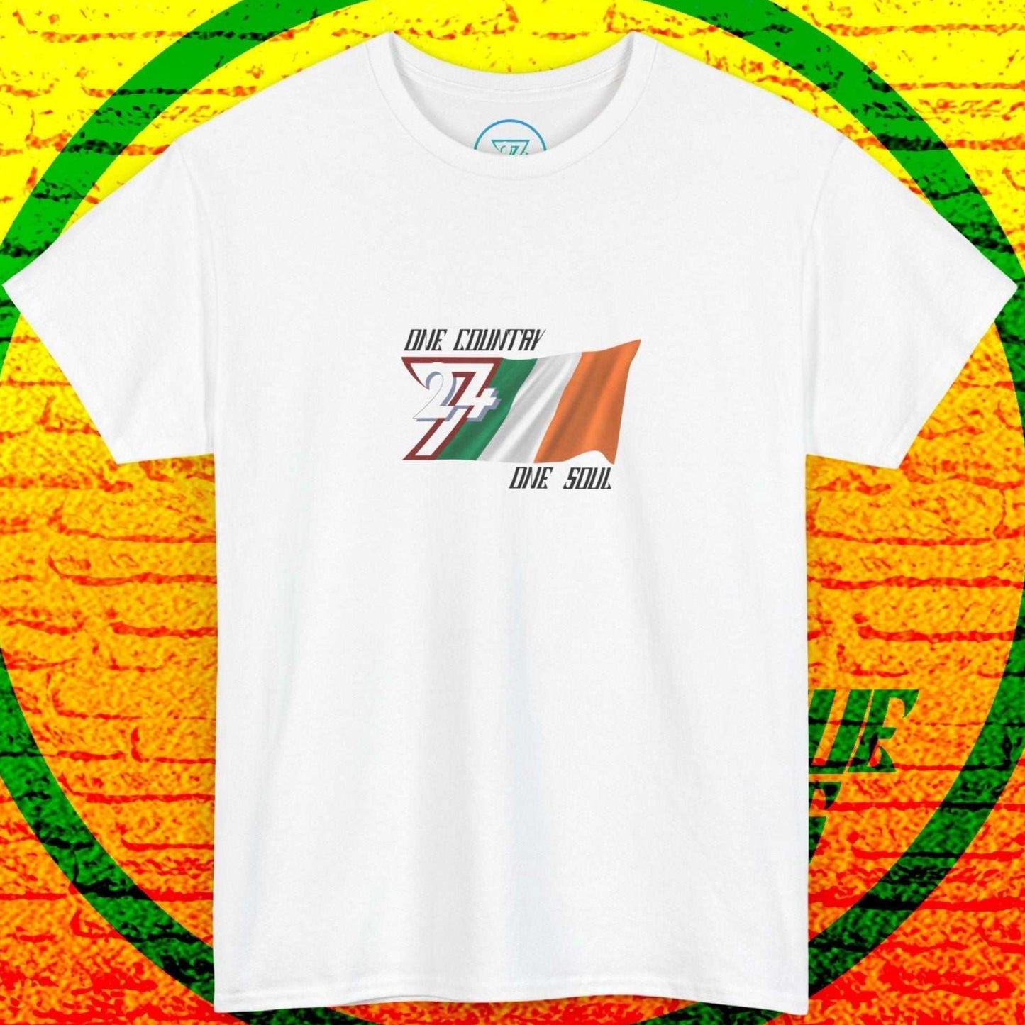 Centered product shot of the white Ireland "Emerald" edition tee with the hand-sketched flag and signature slogan.